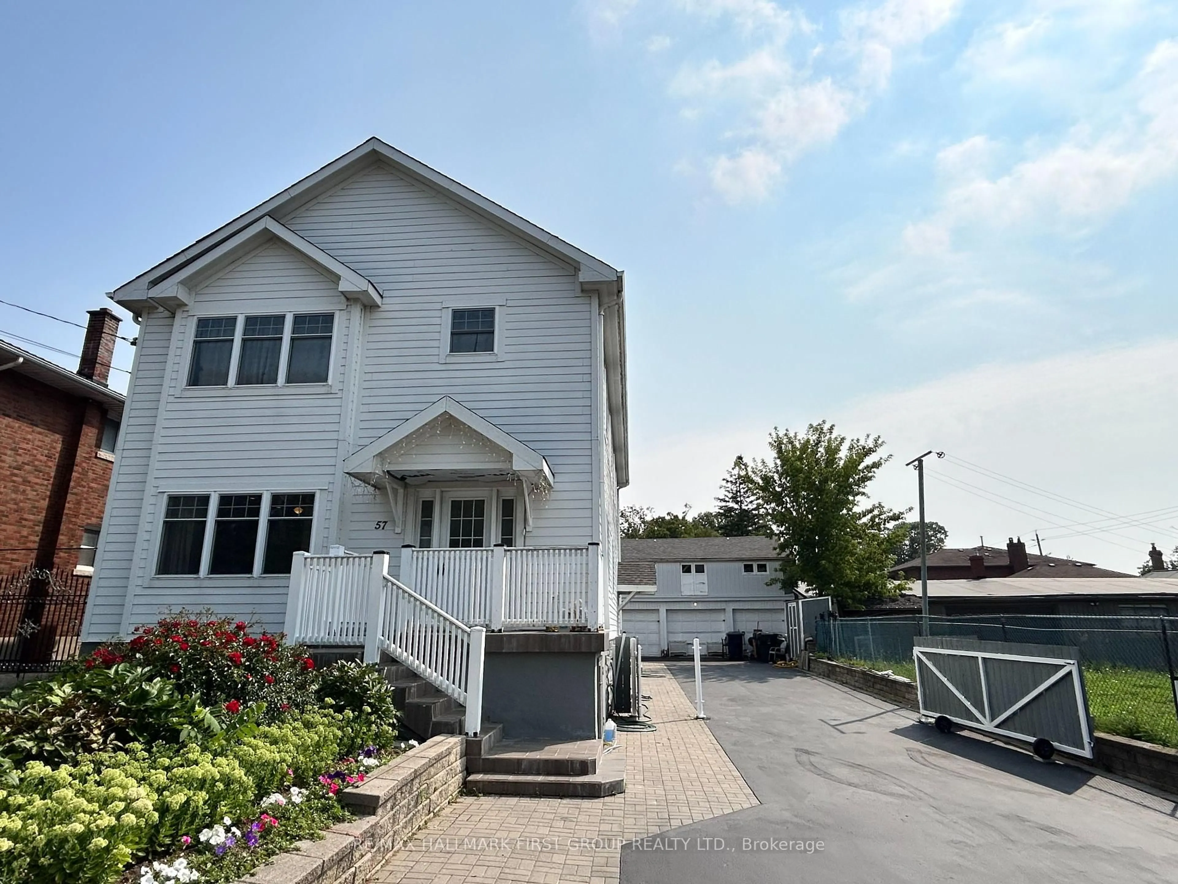 Home with vinyl exterior material, street for 57 Wendell Ave, Toronto Ontario M9N 3K8