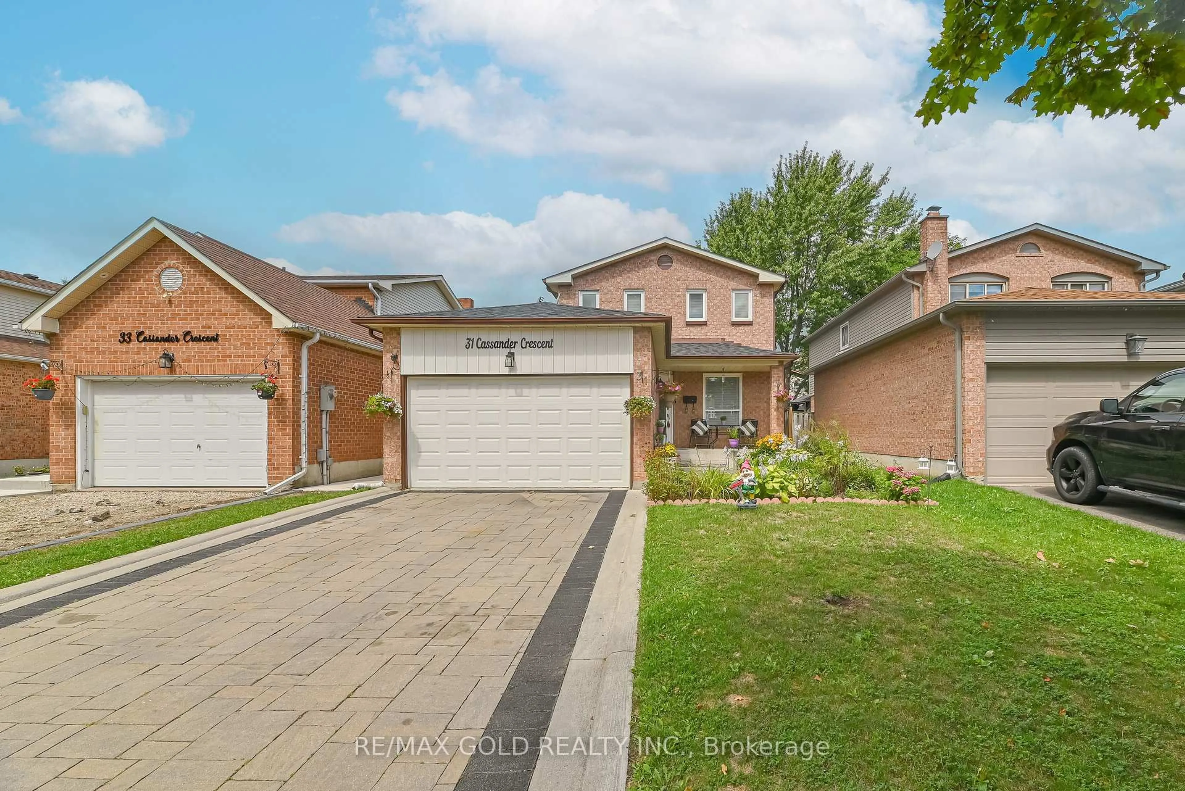 Home with brick exterior material, street for 31 Cassander Cres, Brampton Ontario L6Z 1Z5