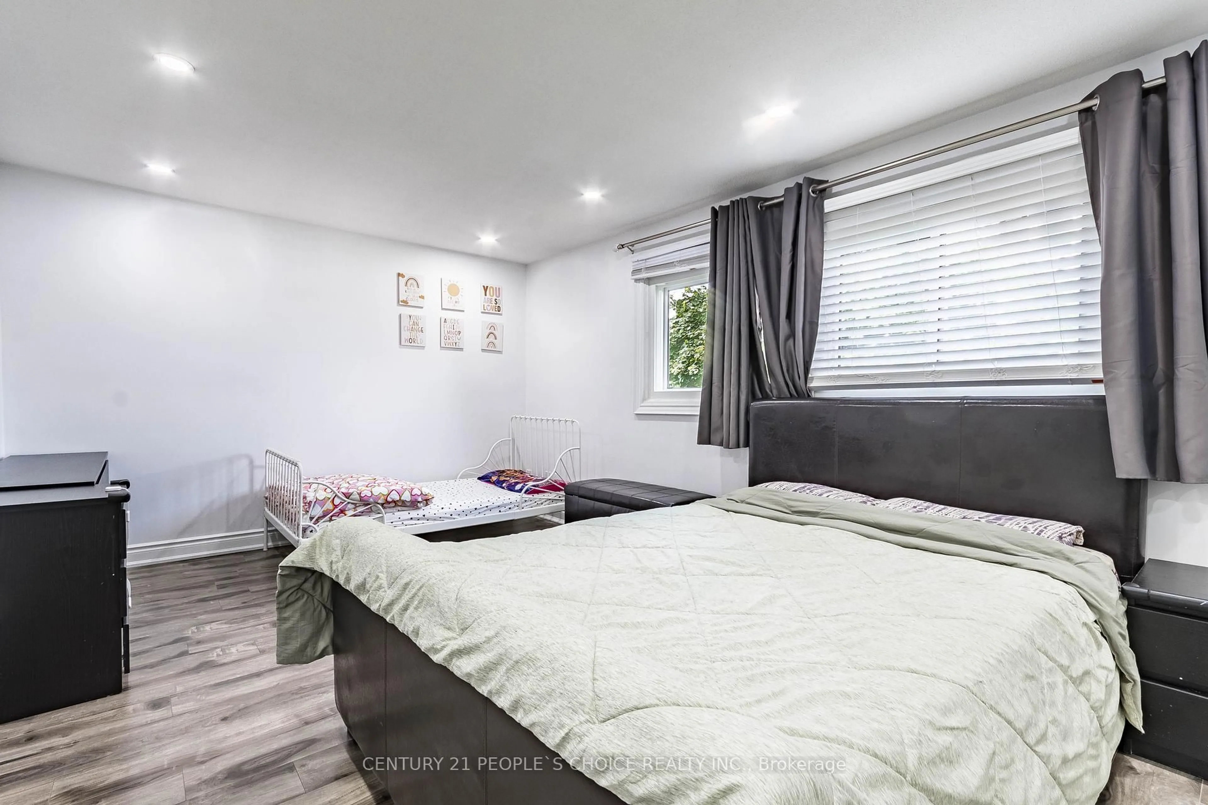 Bedroom with bed, wood/laminate floor for 31 Mccallum Crt #31, Brampton Ontario L6W 3M4
