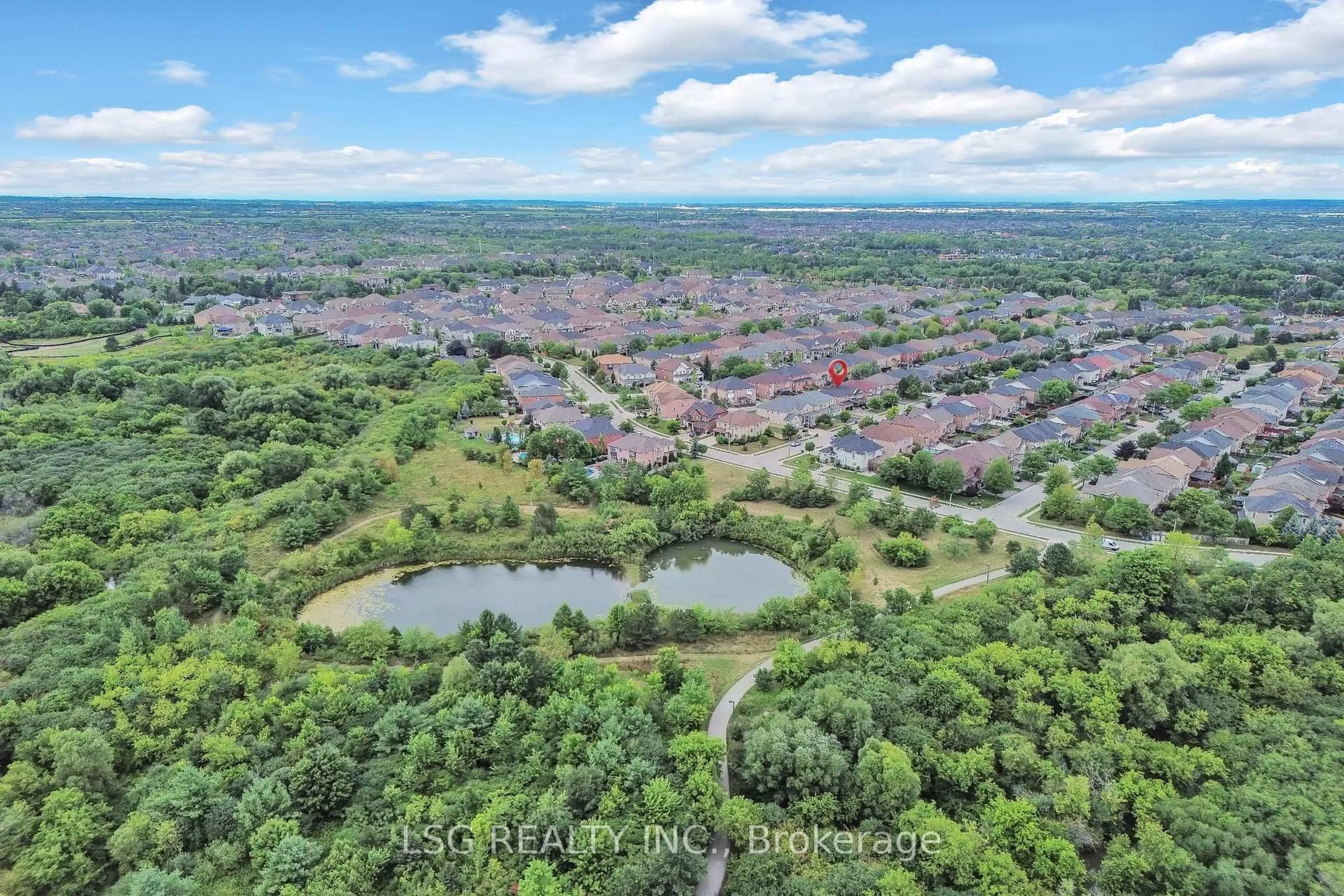 A pic from outside/outdoor area/front of a property/back of a property/a pic from drone, forest/trees view for 54 Richgrove Dr, Brampton Ontario L6P 1X6