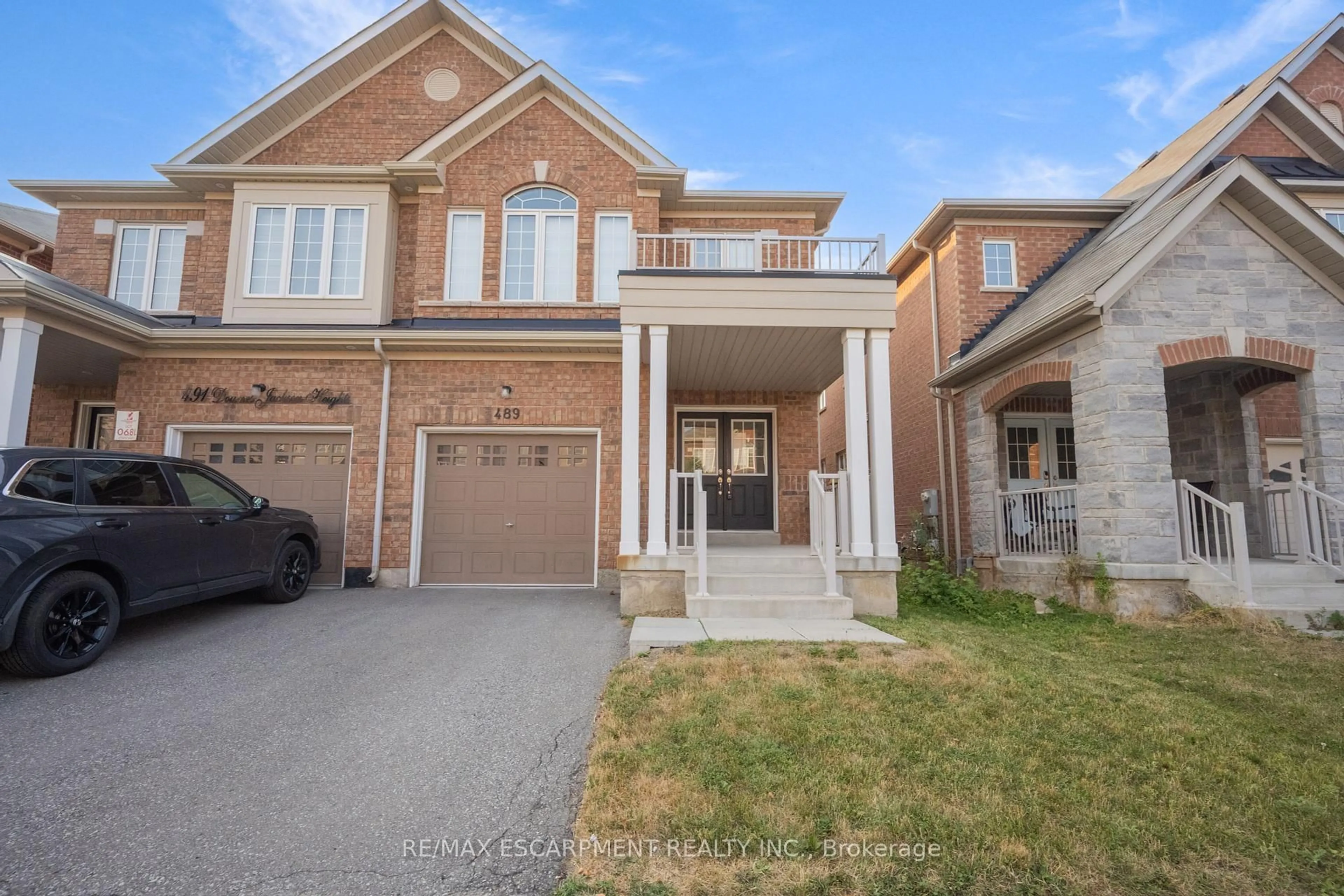 Home with brick exterior material, street for 489 Downes Jackson Hts, Milton Ontario L9T 8W1