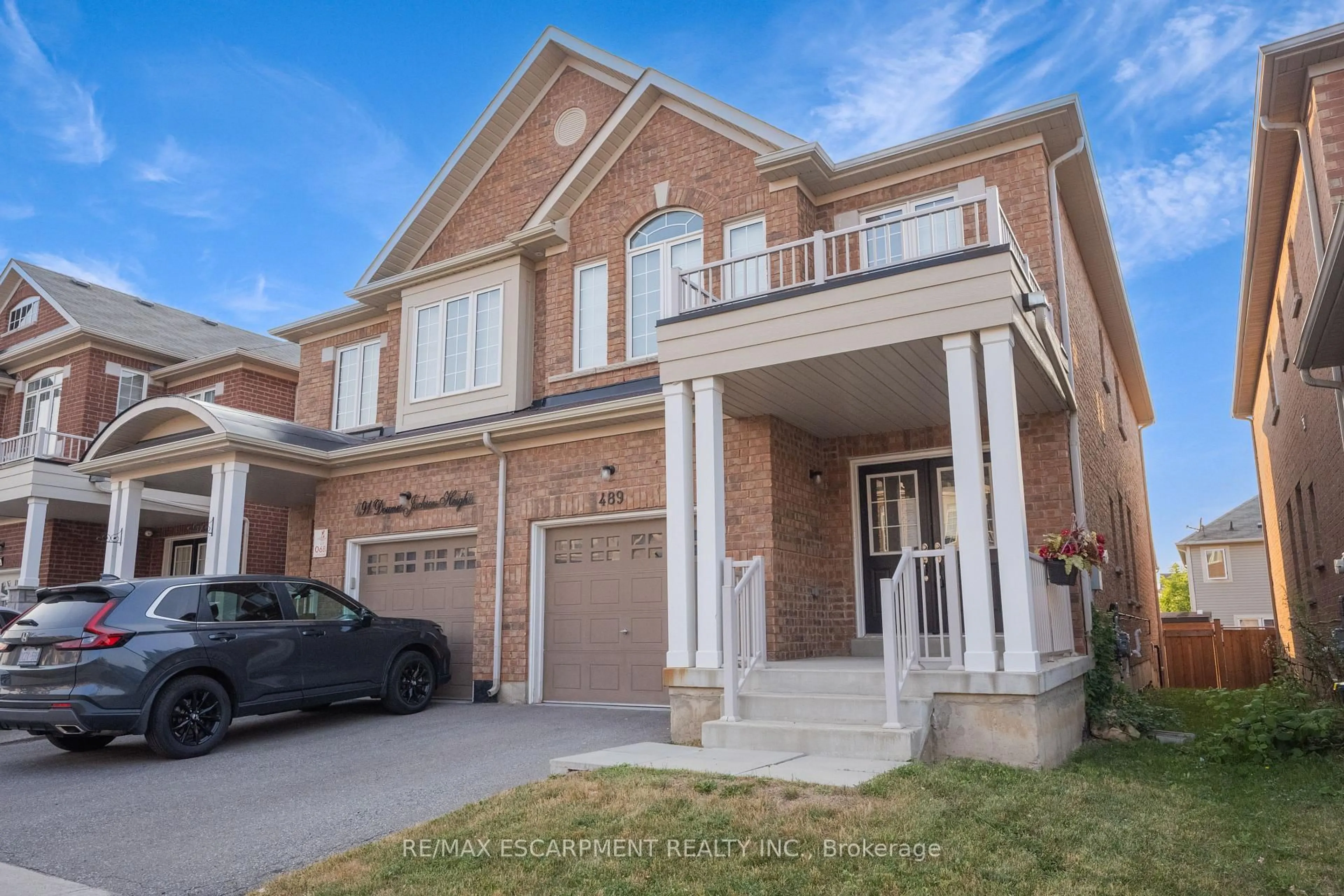 Home with brick exterior material, street for 489 Downes Jackson Hts, Milton Ontario L9T 8W1