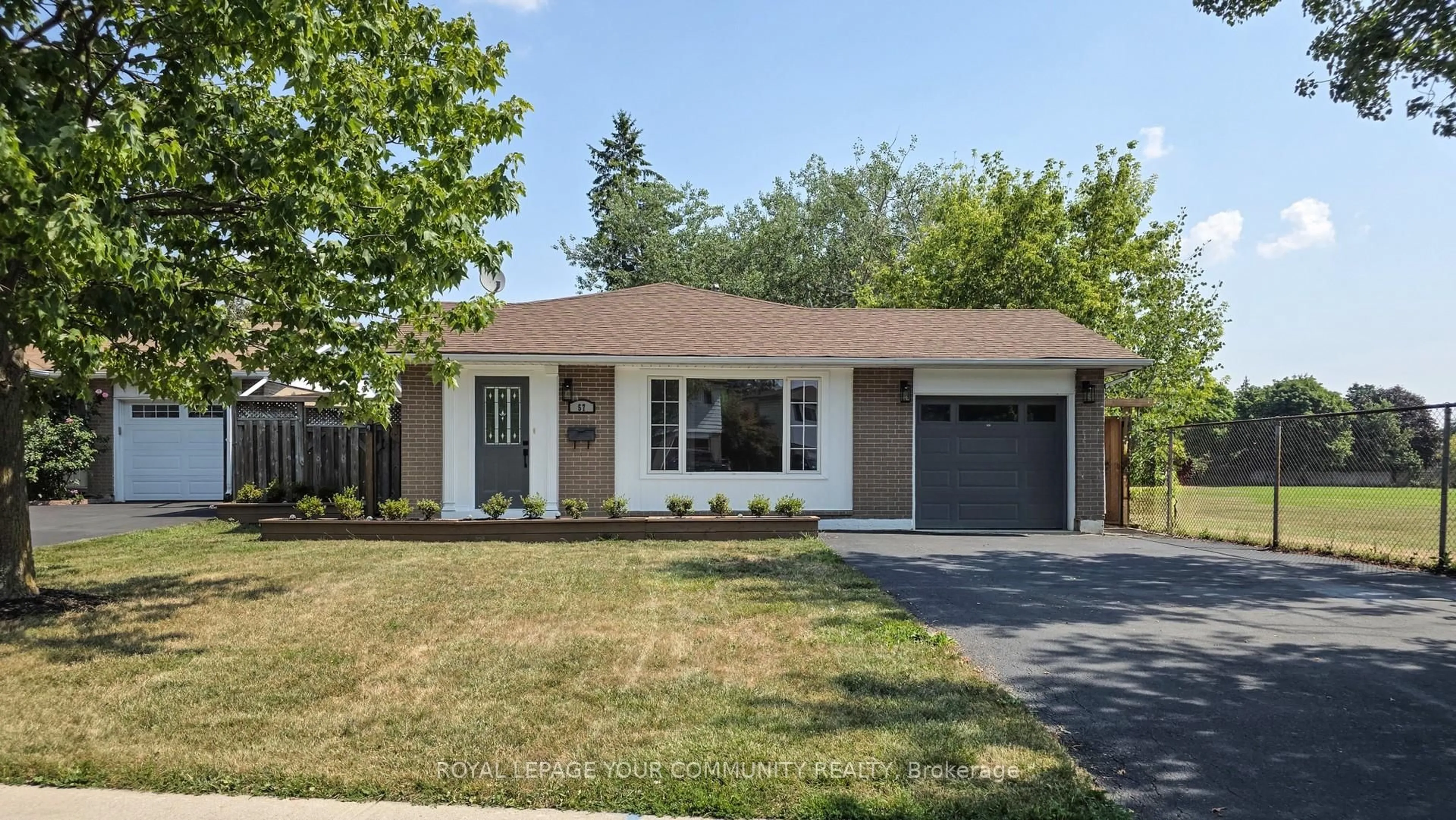 Home with brick exterior material, street for 57 Bartley Bull Pkwy, Brampton Ontario L6W 2J5