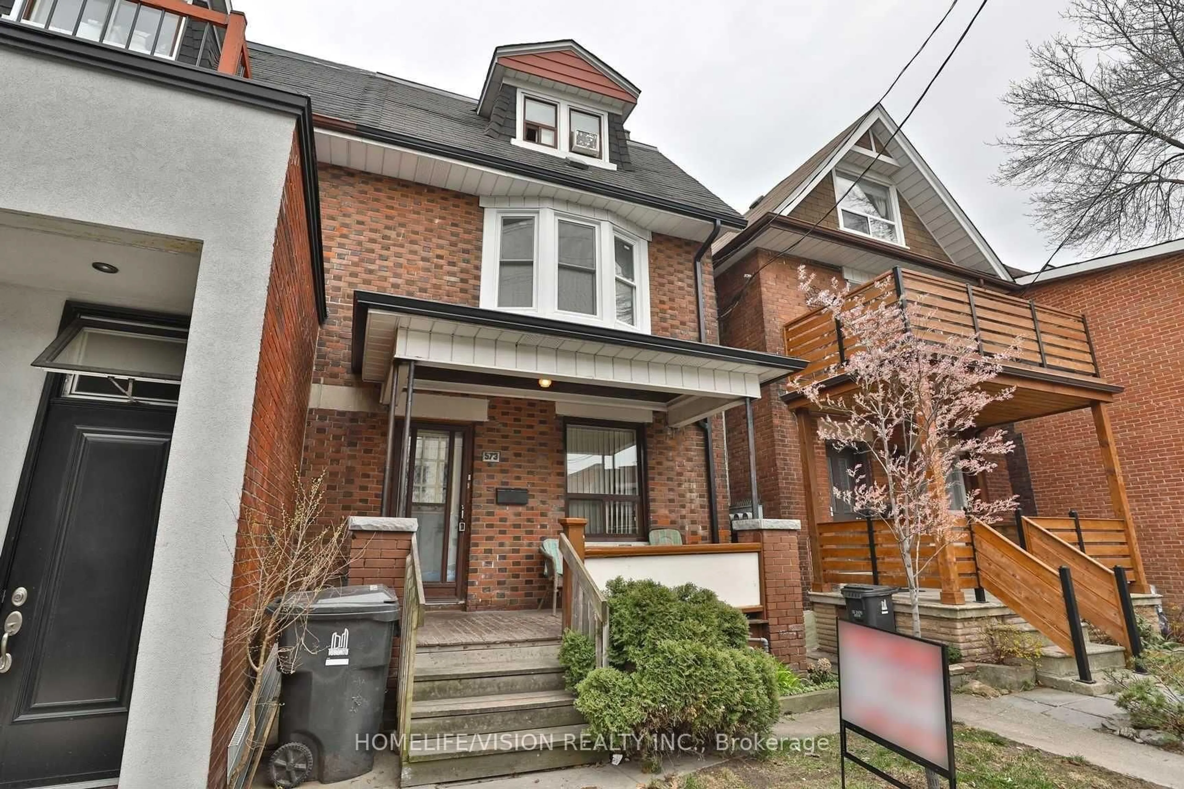 Home with brick exterior material, street for 573 Annette St, Toronto Ontario M6S 2C3