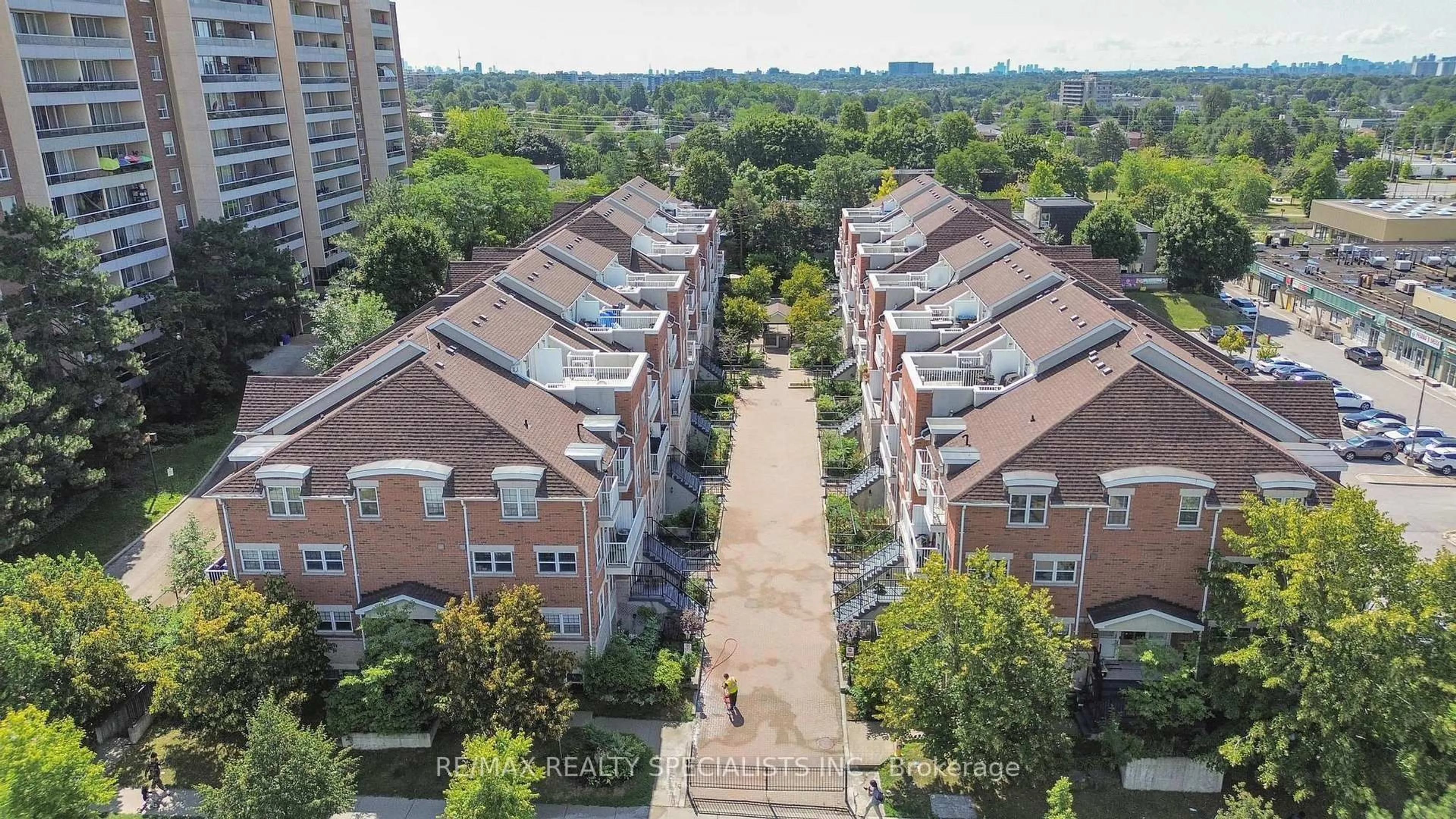 A pic from outside/outdoor area/front of a property/back of a property/a pic from drone, city buildings view from balcony for 37 Four Winds Dr #80, Toronto Ontario M3J 1K7