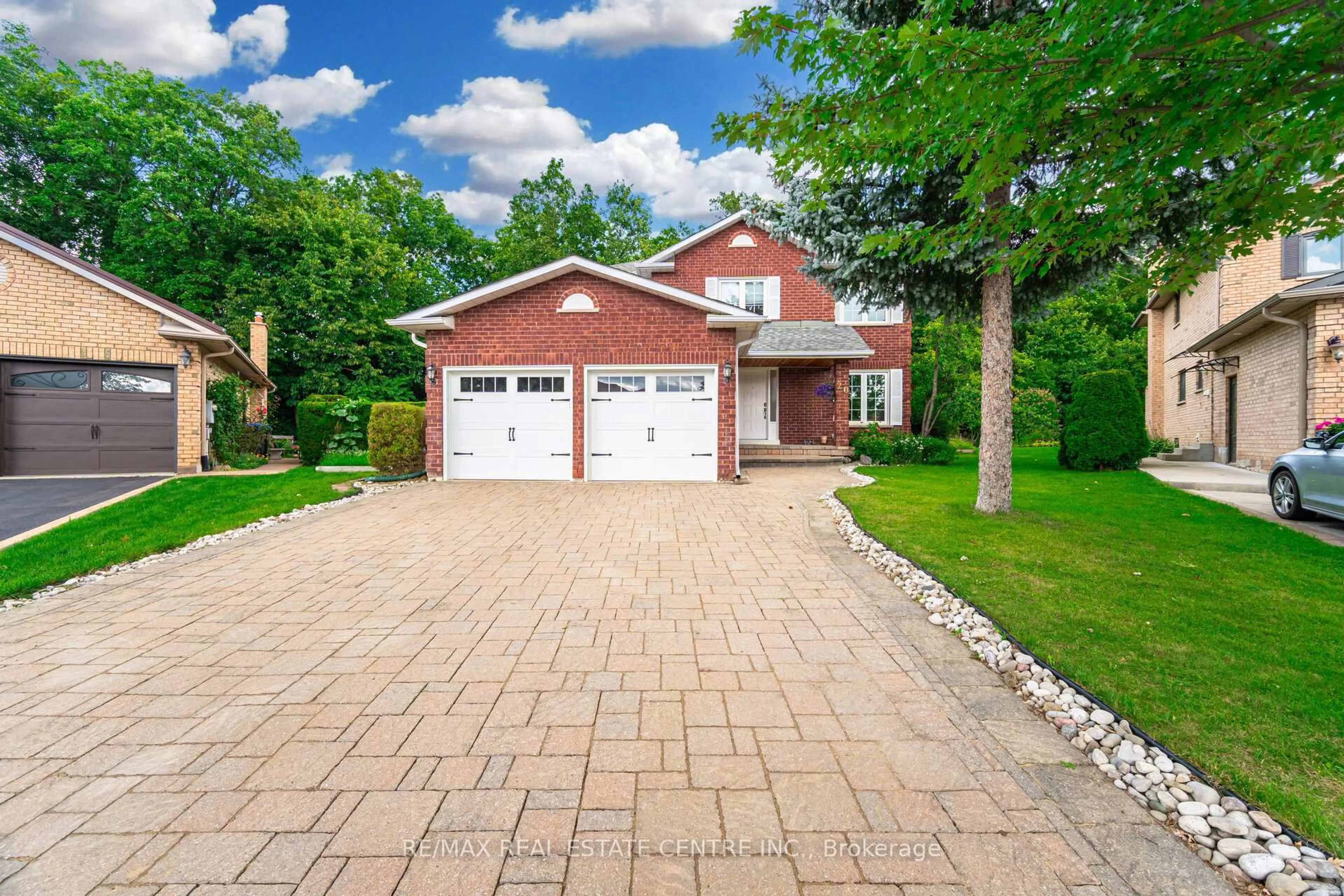Home with brick exterior material, street for 20 Woodbury Crt, Brampton Ontario L6Y 4K5