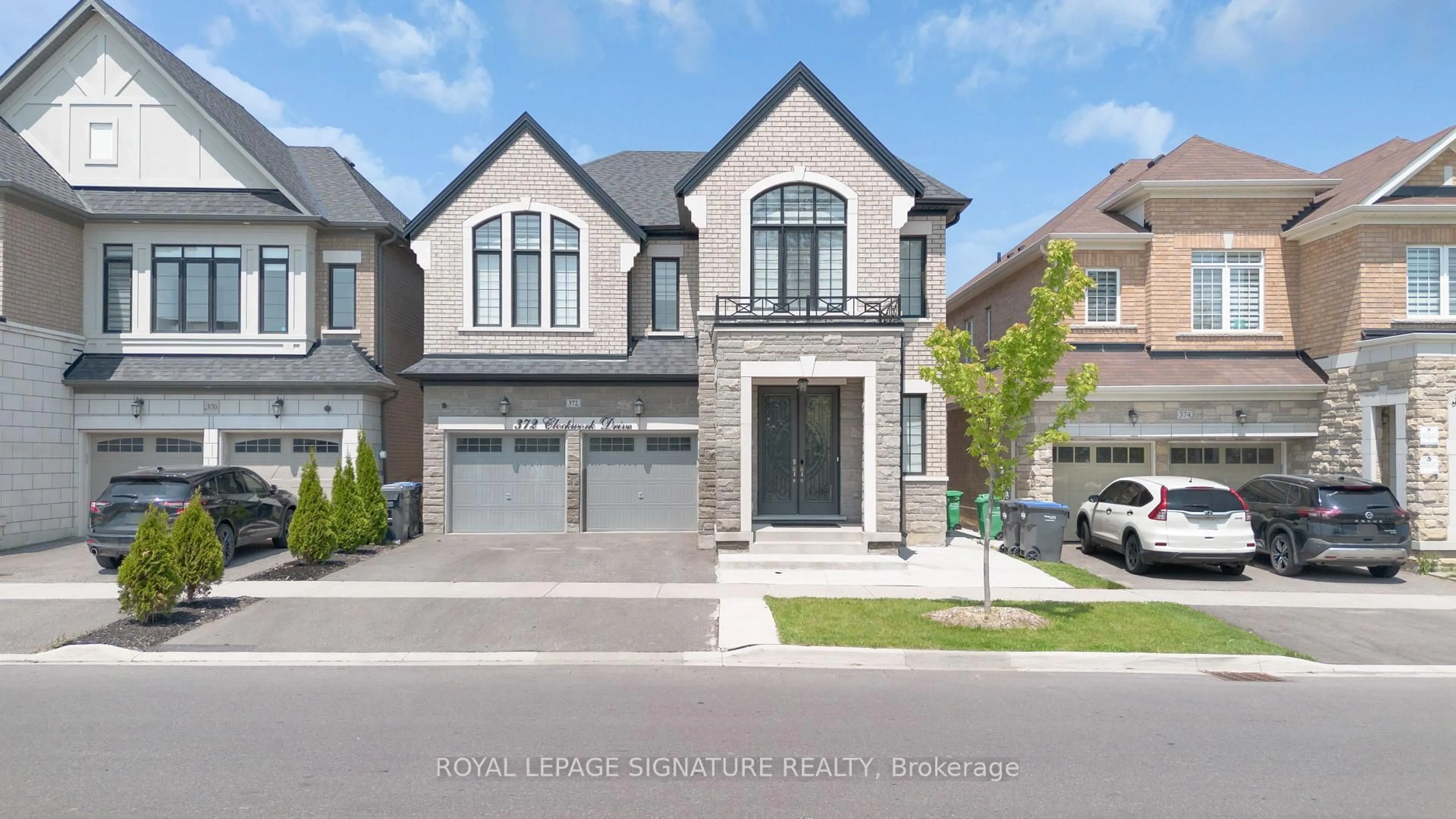 Home with brick exterior material, street for 372 Clockwork Dr, Brampton Ontario L7A 5C3