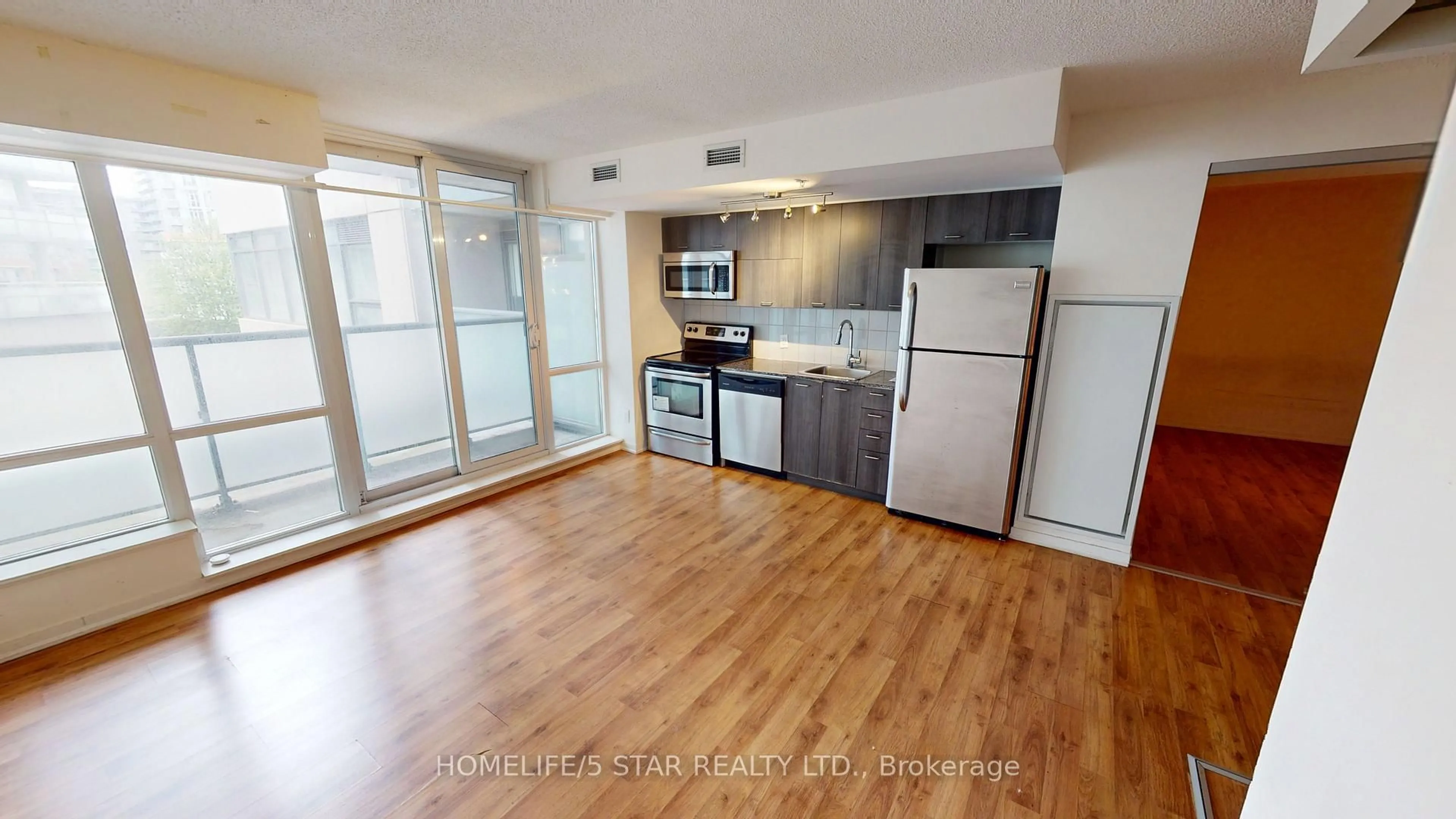 Standard kitchen, wood/laminate floor for 20 JOE SHUSTER Way #321, Toronto Ontario M6K 0A3