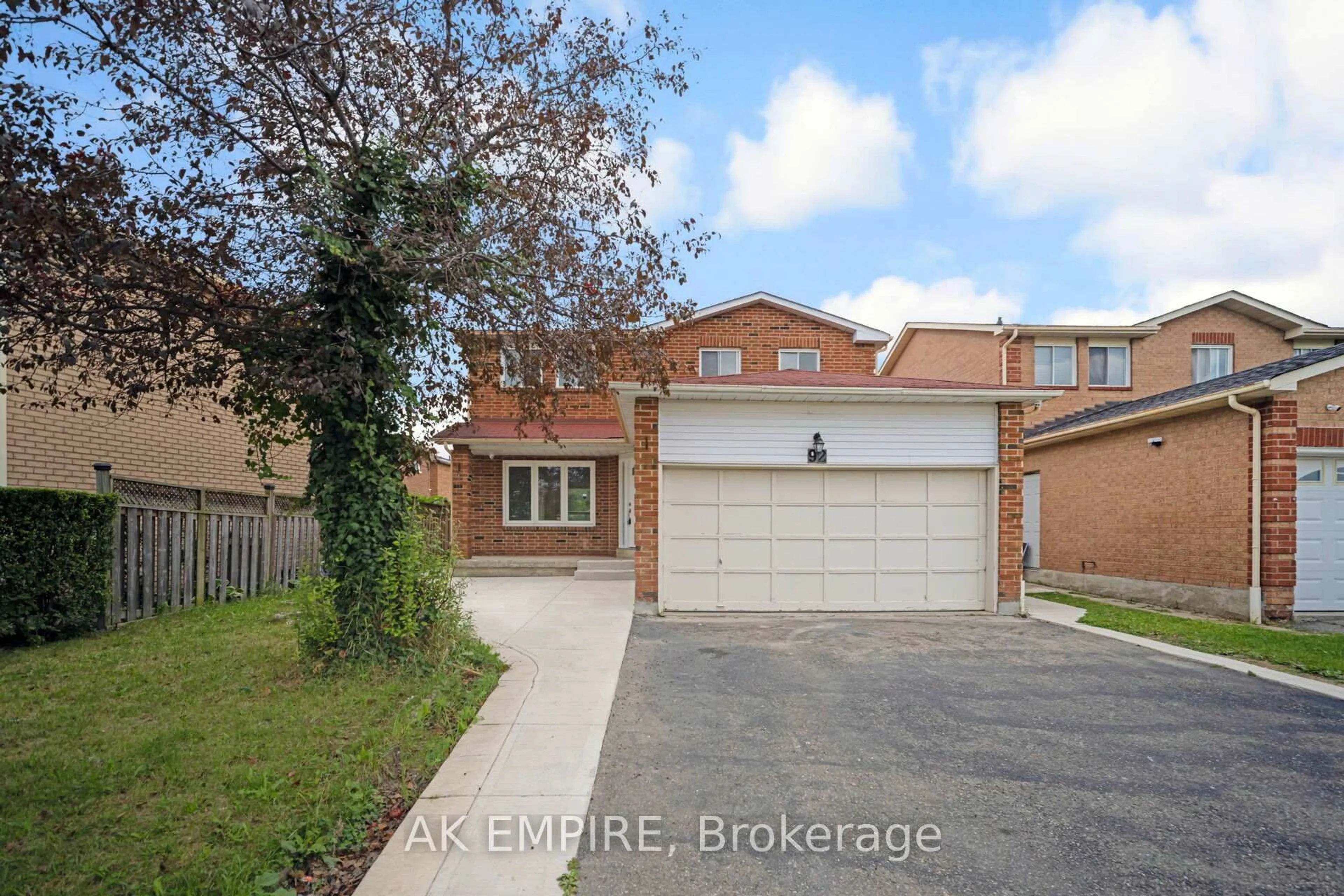 Home with brick exterior material, street for 92 Whitehaven Dr, Brampton Ontario L6Z 2R8