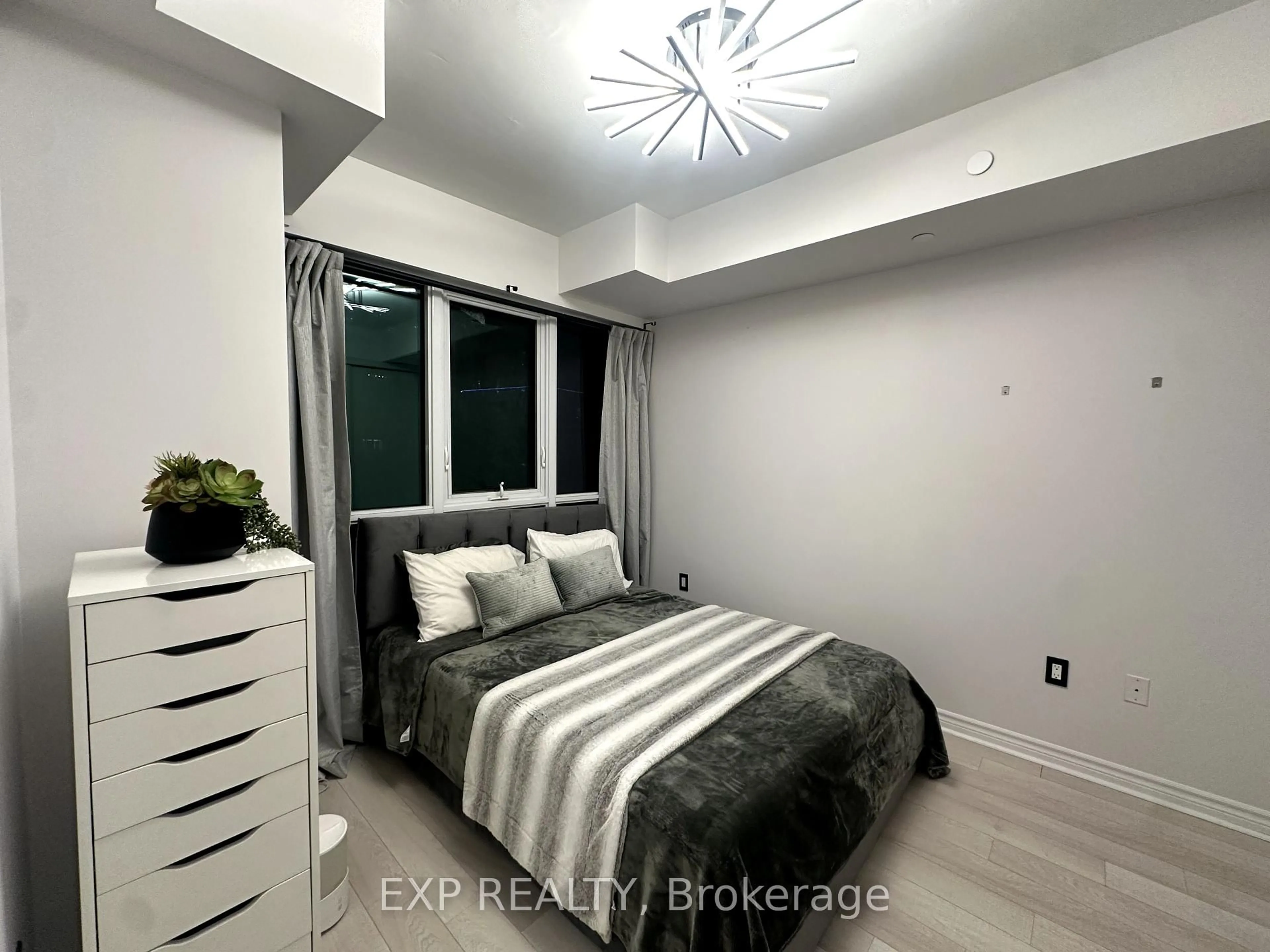 Bedroom with bed, unknown for 39 Annie Craig Dr #602, Toronto Ontario M8V 0H1