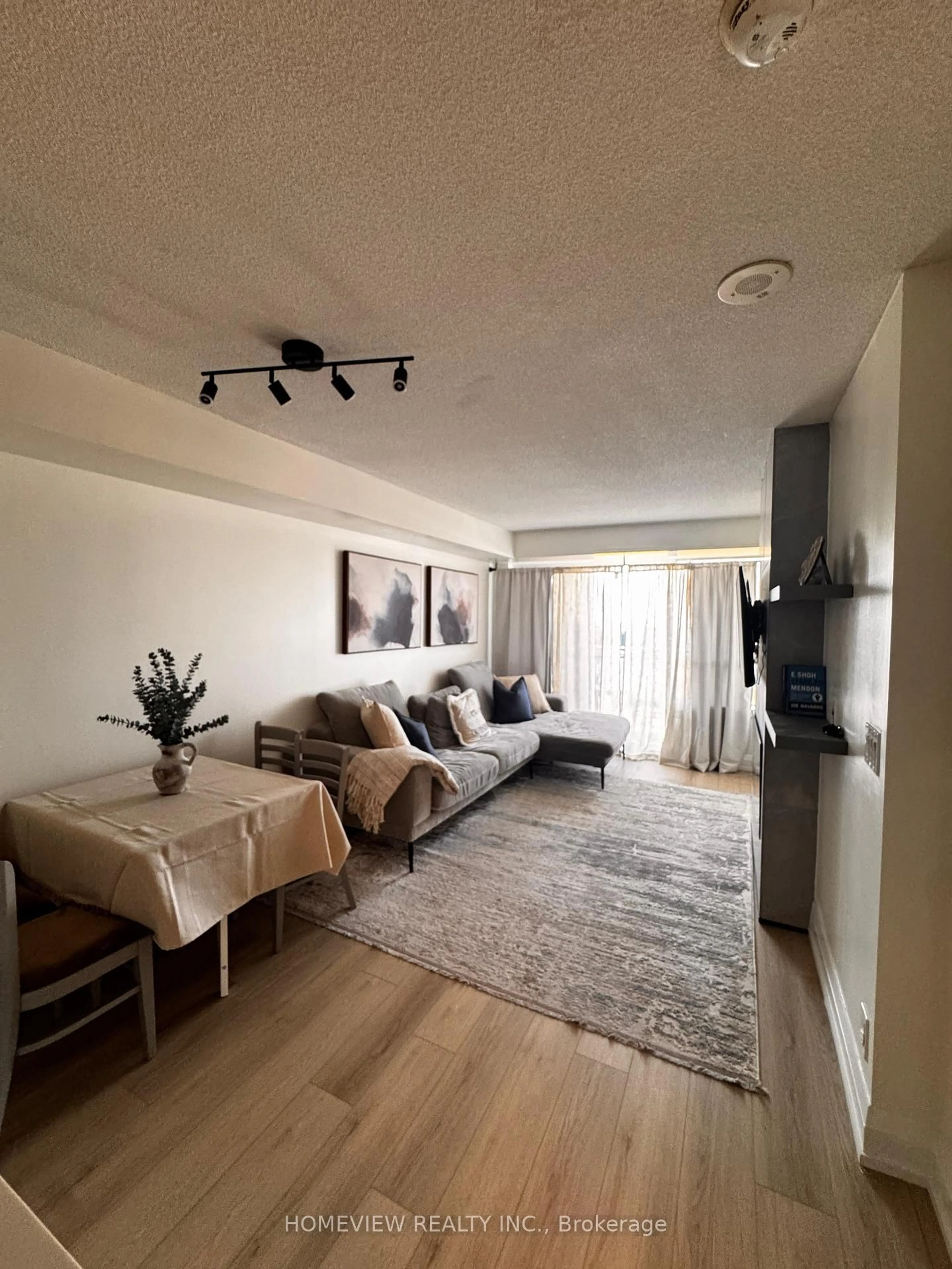 Living room with furniture, unknown for 1070 Sheppard Ave #1211, Toronto Ontario M3J 0G8