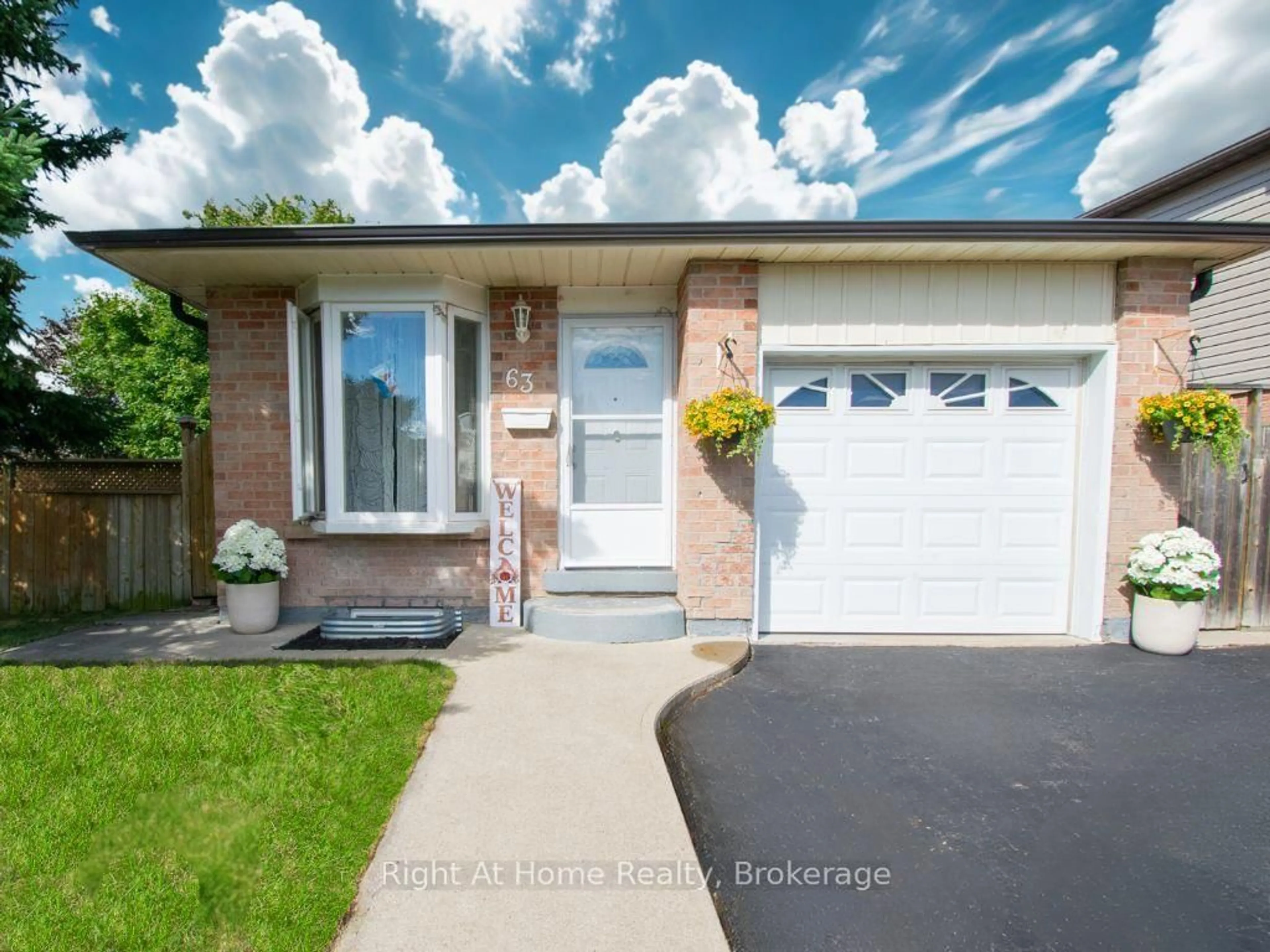 Home with brick exterior material, street for 63 Martindale Cres, Brampton Ontario L6X 2V7