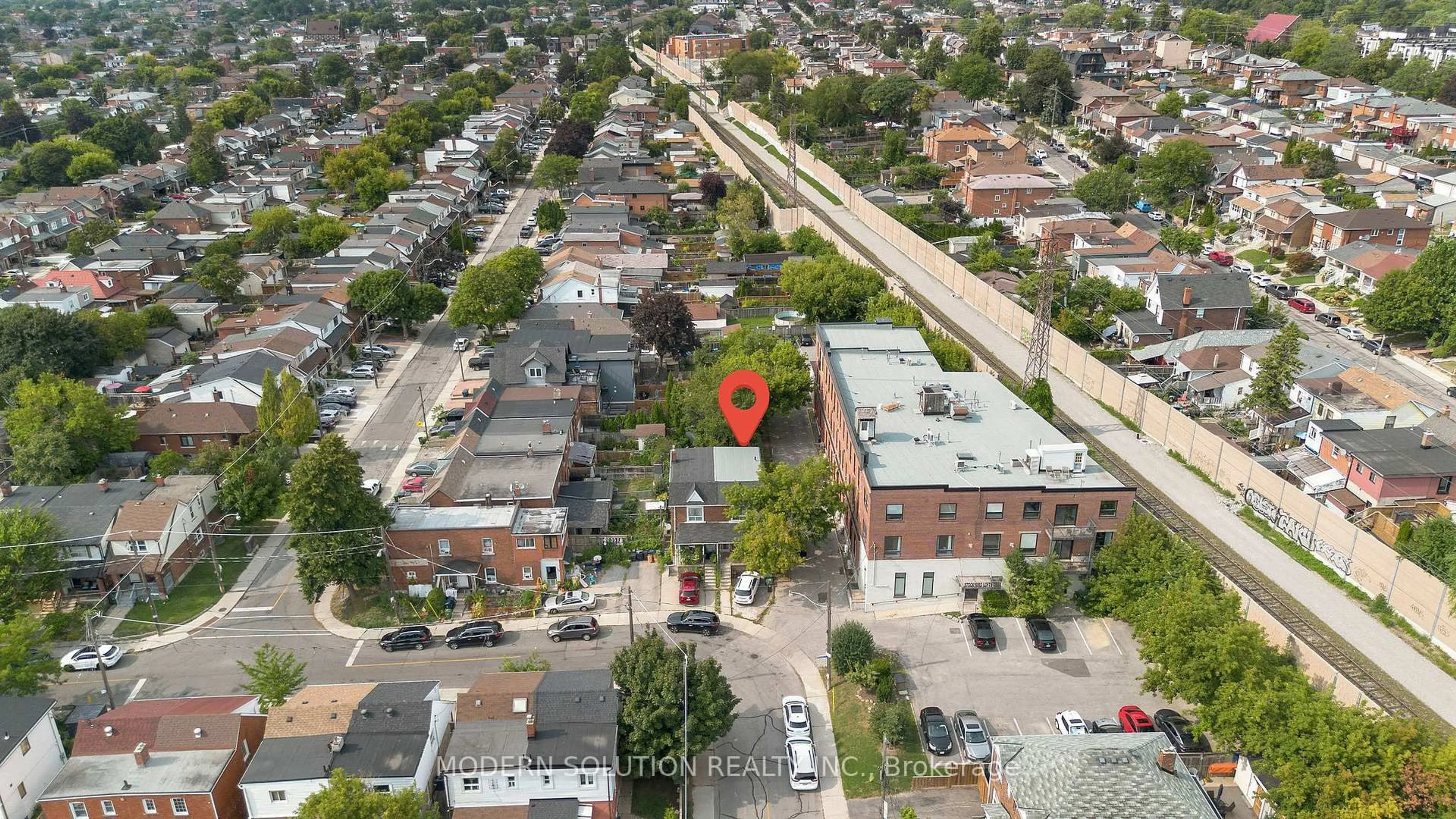 A pic from outside/outdoor area/front of a property/back of a property/a pic from drone, street for 2 Rockwell Ave, Toronto Ontario M6N 1N3
