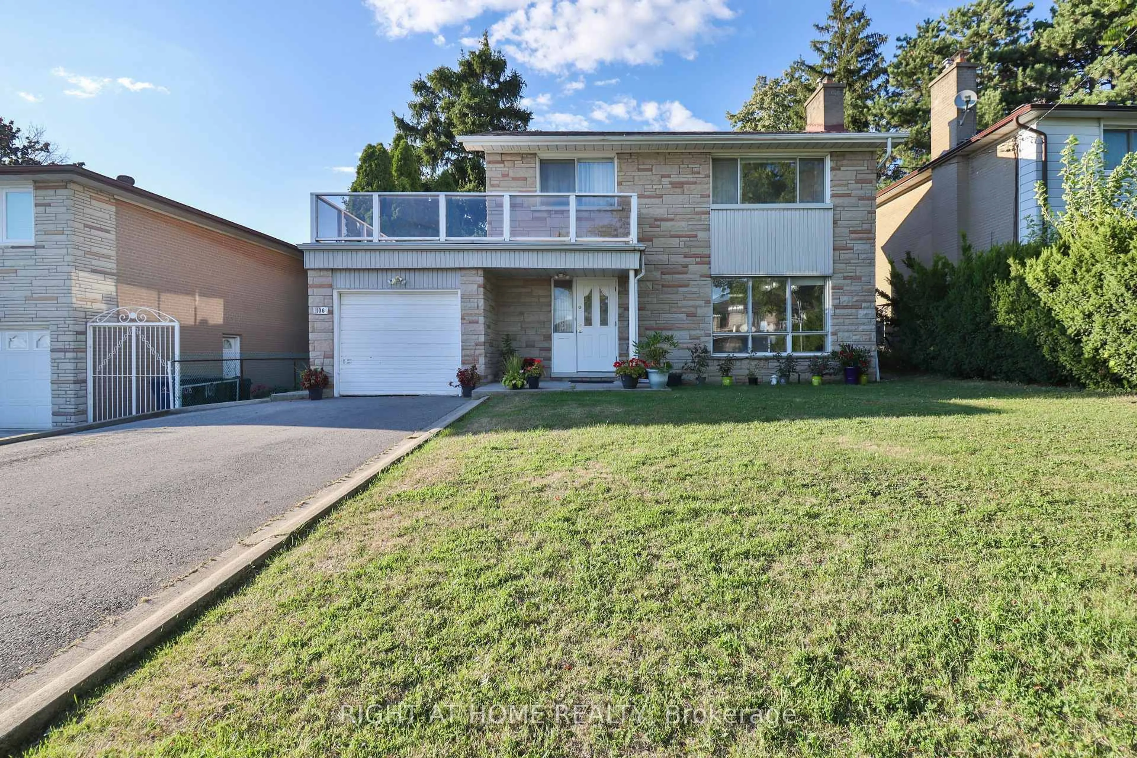 Home with brick exterior material, street for 106 Grandravine Dr, Toronto Ontario M3J 1B4