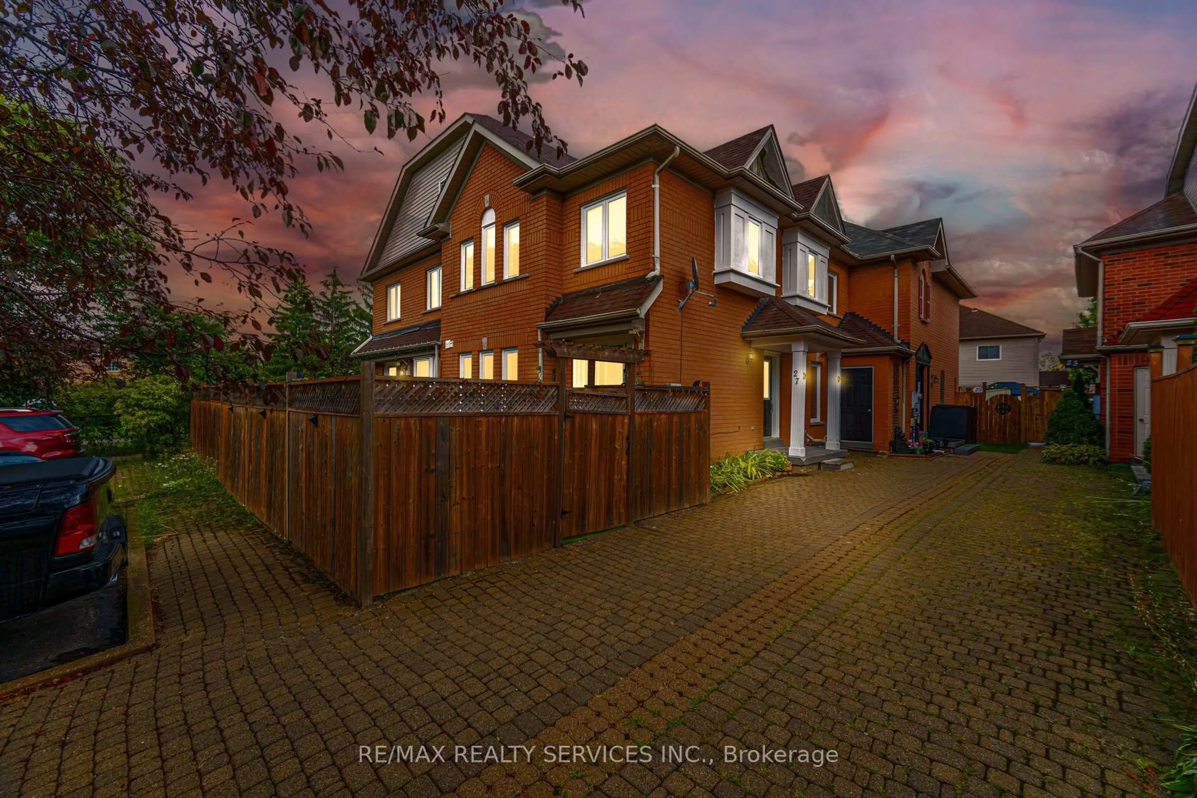 Home with brick exterior material, street for 27 Rain Lily Lane, Brampton Ontario L6R 1S4