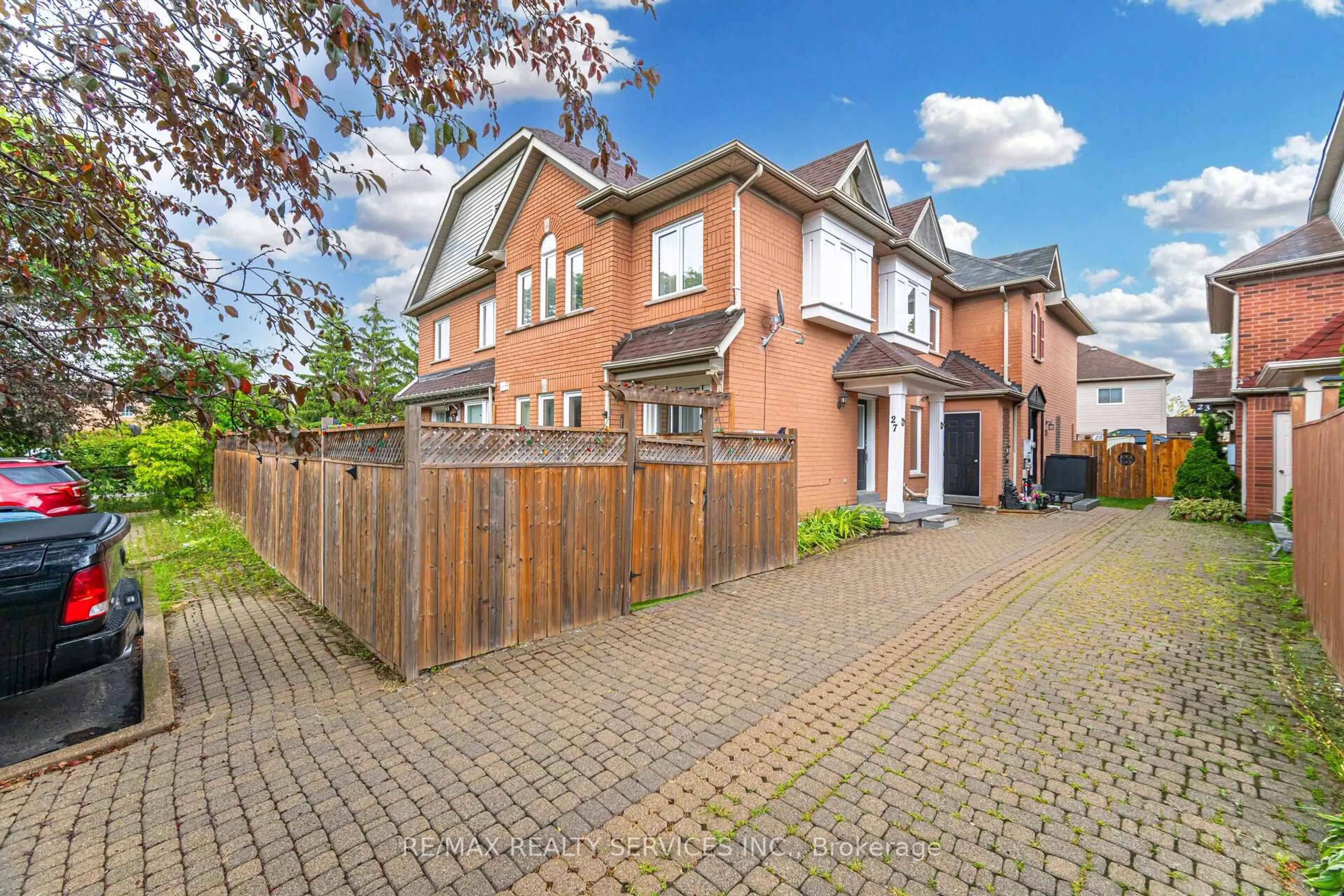 Home with brick exterior material, street for 27 Rain Lily Lane, Brampton Ontario L6R 1S4