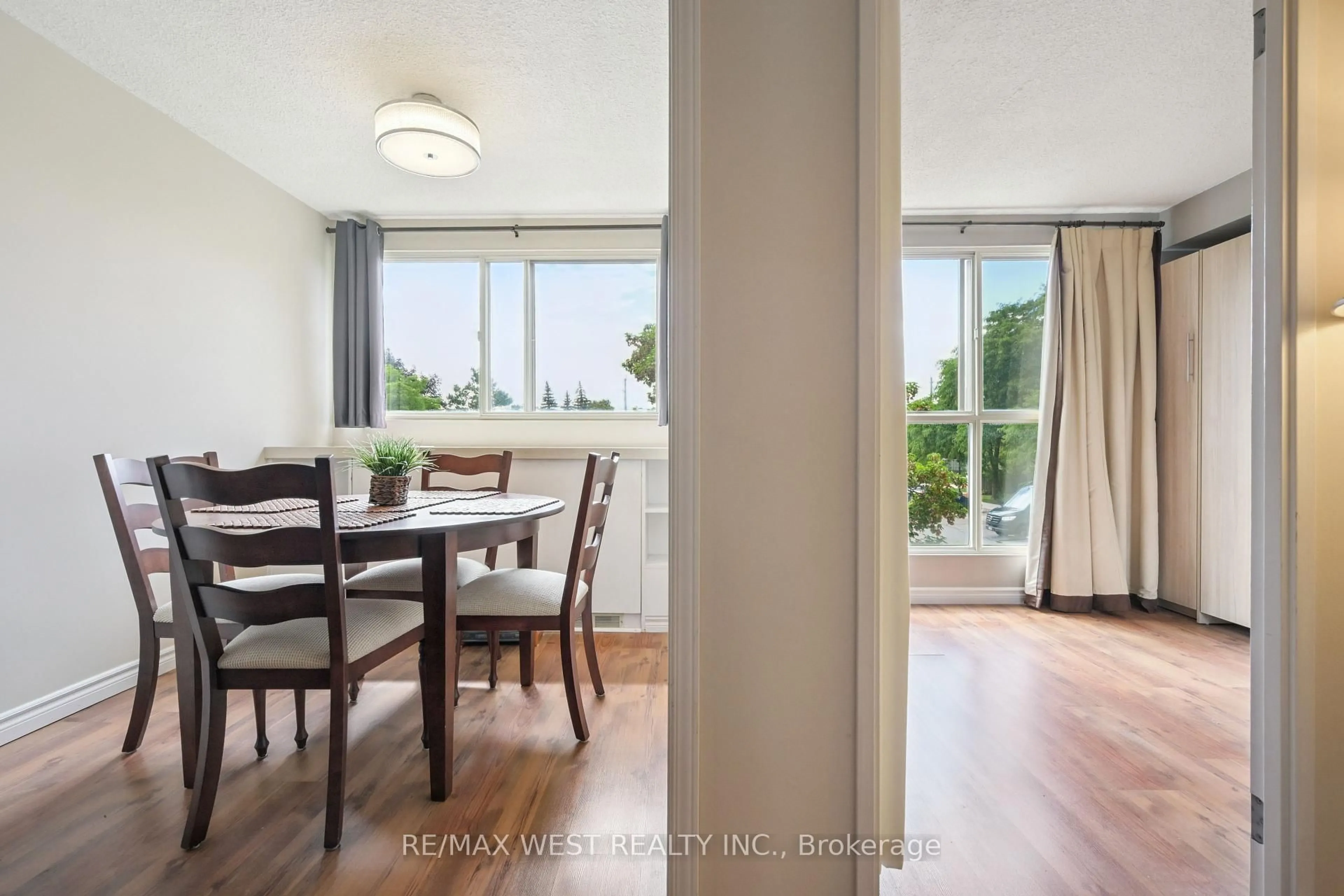 Dining room, wood/laminate floor for 8351 McLaughlin Rd #241, Brampton Ontario L6Y 4H8