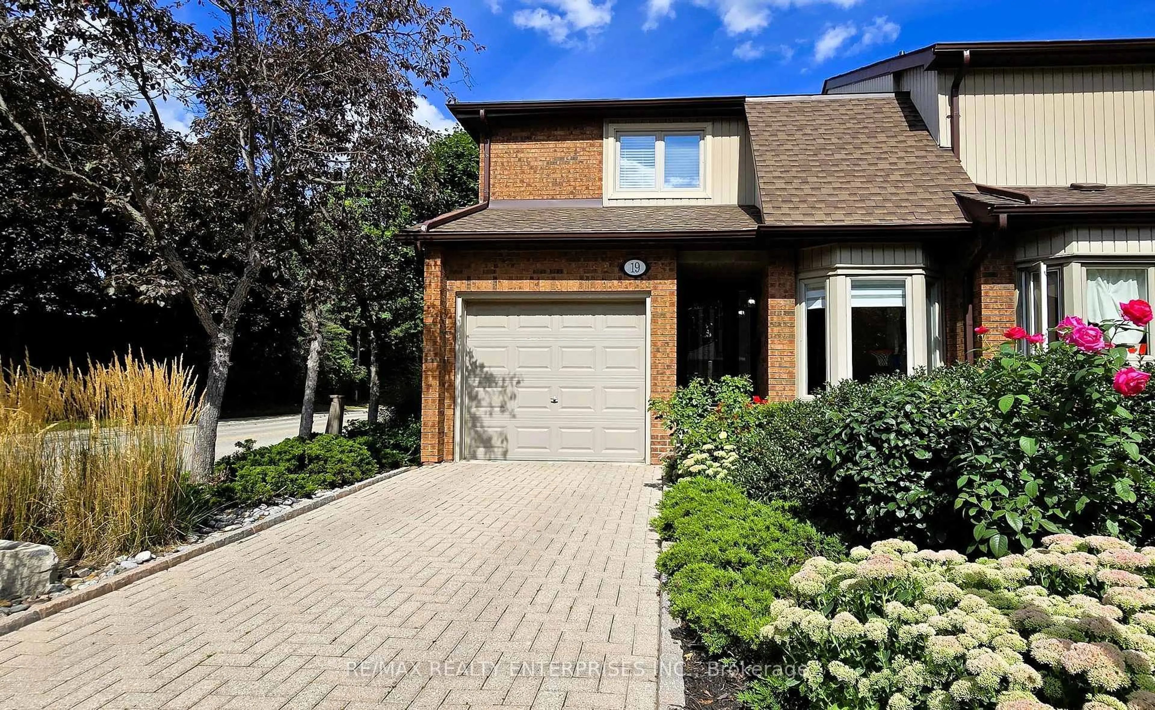 Home with brick exterior material, street for 1180 Walden Circ #19, Mississauga Ontario L5J 4J9