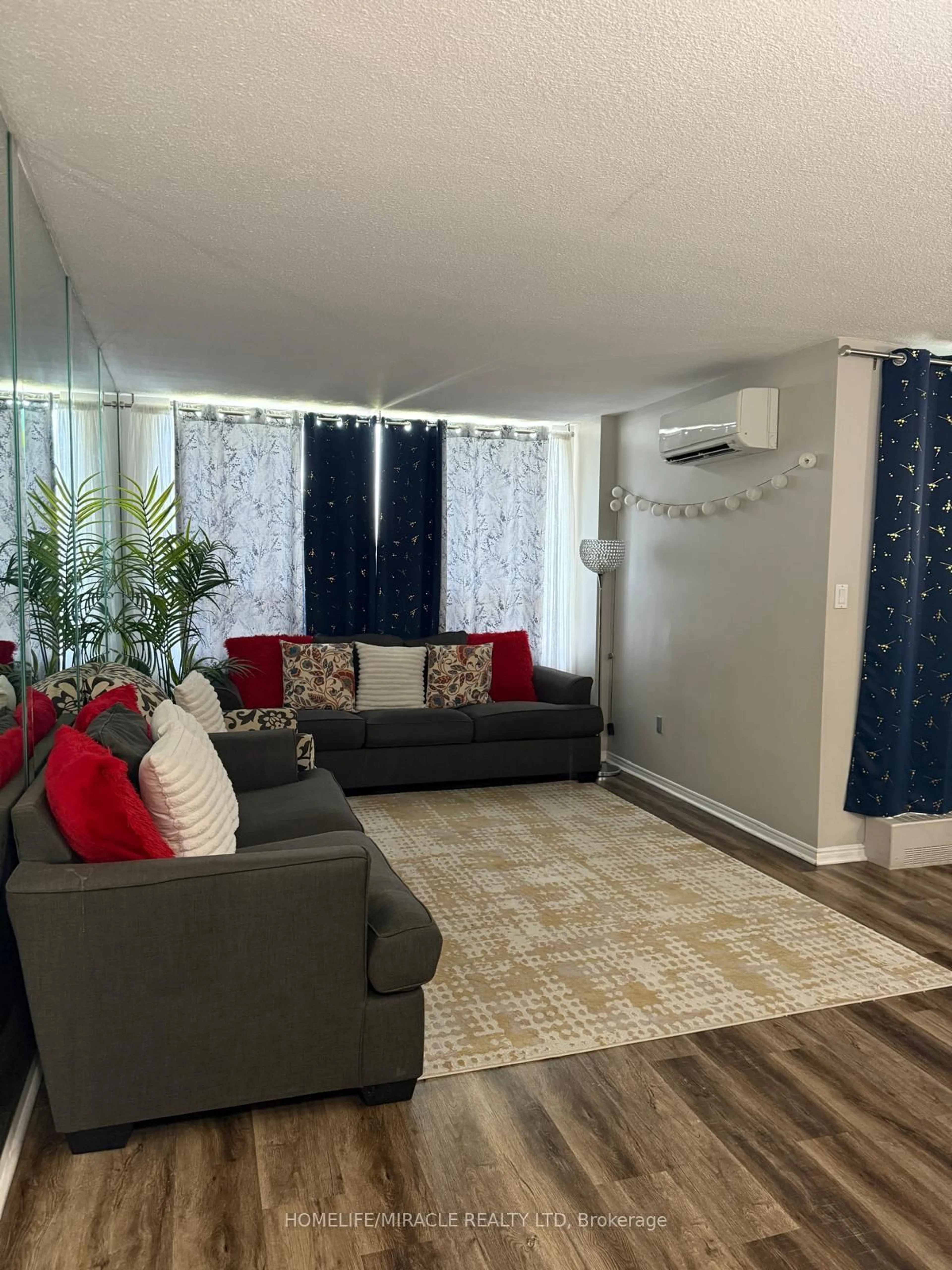 Living room with furniture, unknown for 2556 Argyle Rd #803, Mississauga Ontario L5B 2H6
