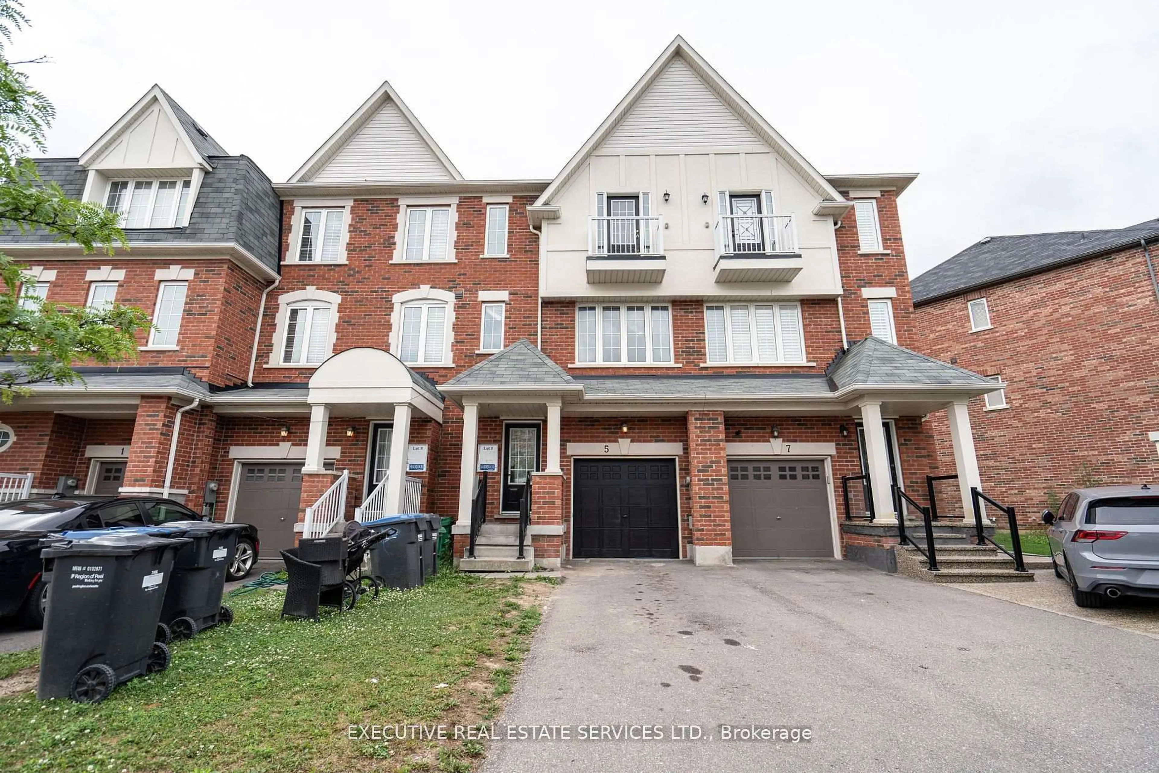 Home with brick exterior material, street for 5 Sprucewood Rd, Brampton Ontario L6Z 0J3