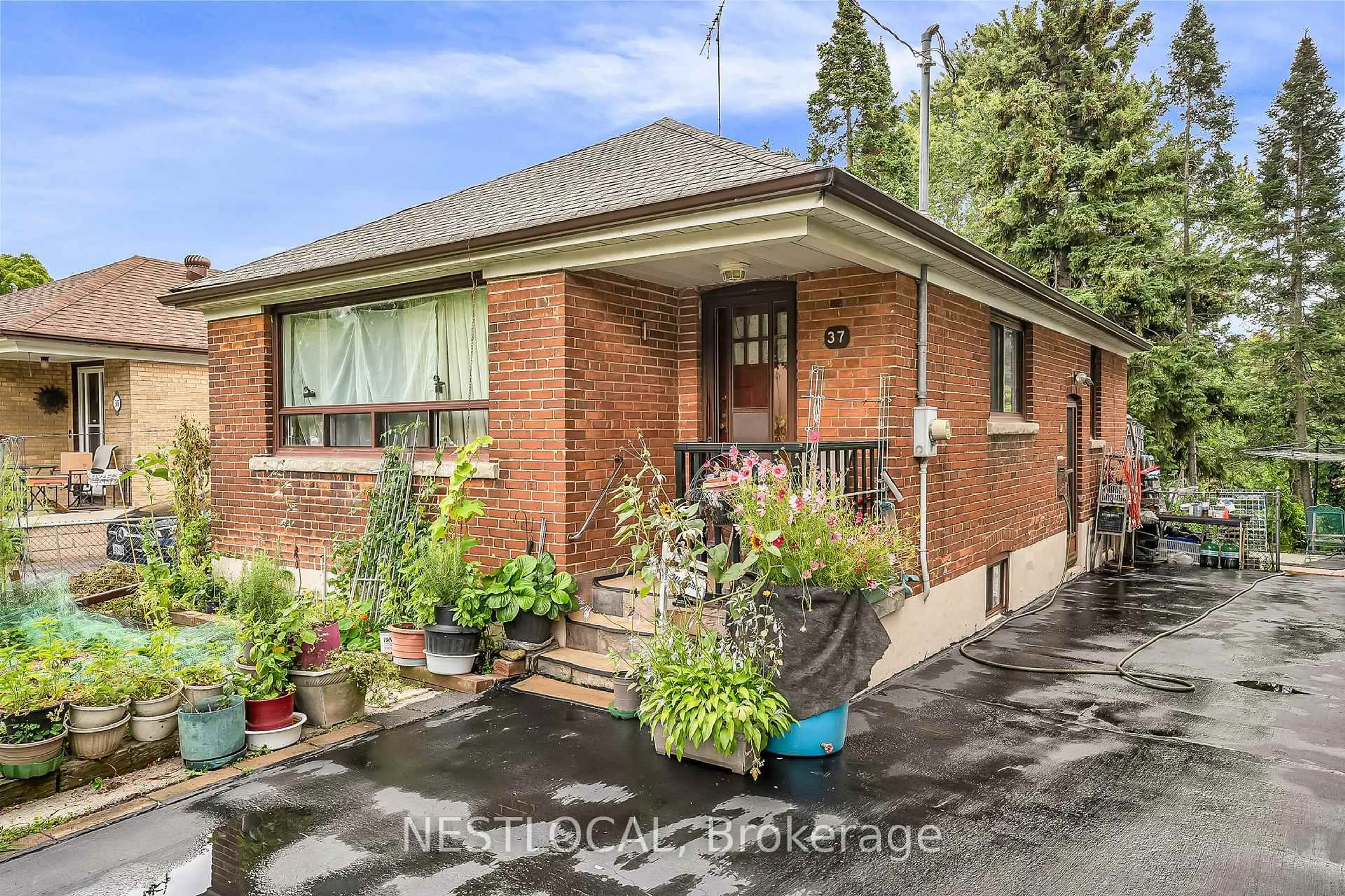 Home with brick exterior material, street for 37 Enfield Ave, Toronto Ontario M8W 1T6