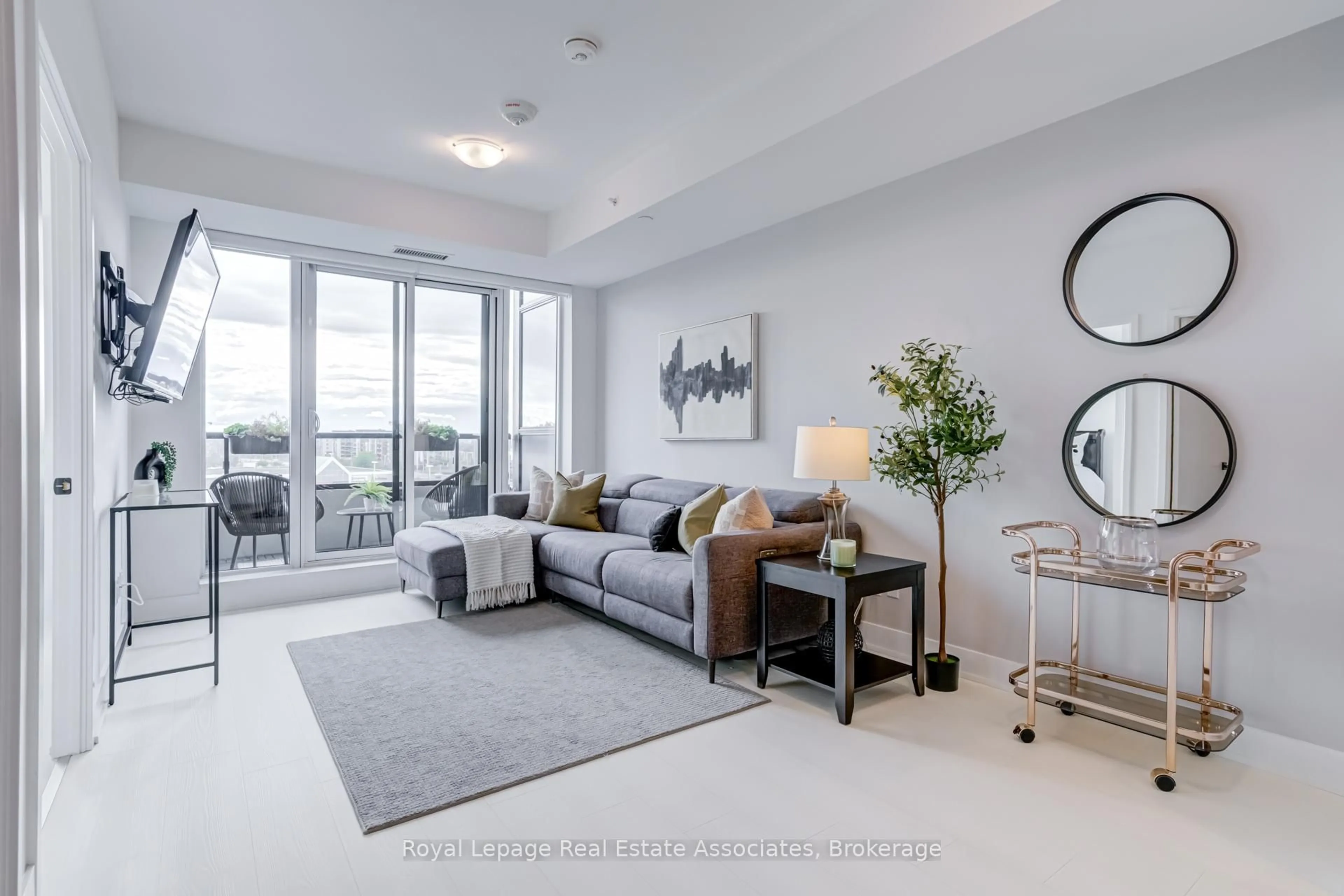 Living room with furniture, unknown for 2481 Taunton Rd #607, Oakville Ontario L6H 0G3