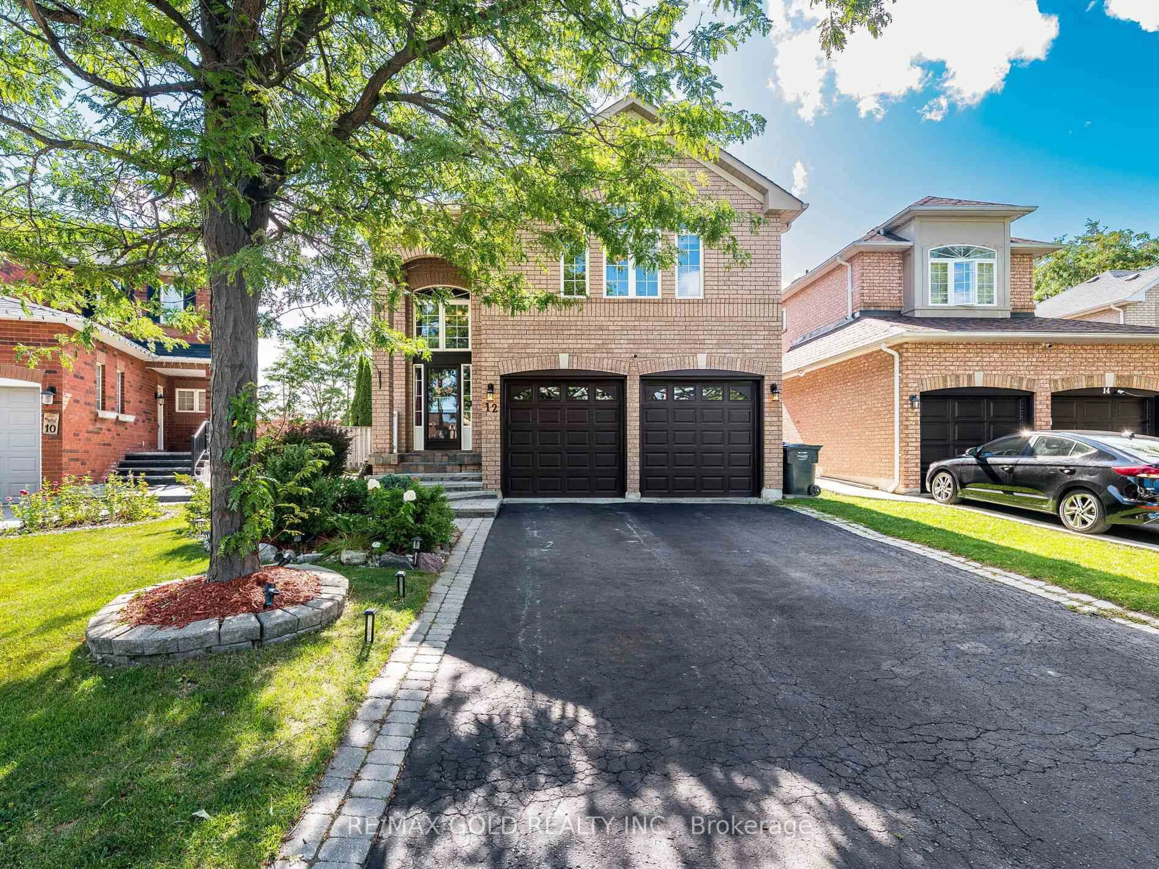 Home with brick exterior material, street for 12 Twin Willow Cres, Brampton Ontario L7A 1J9