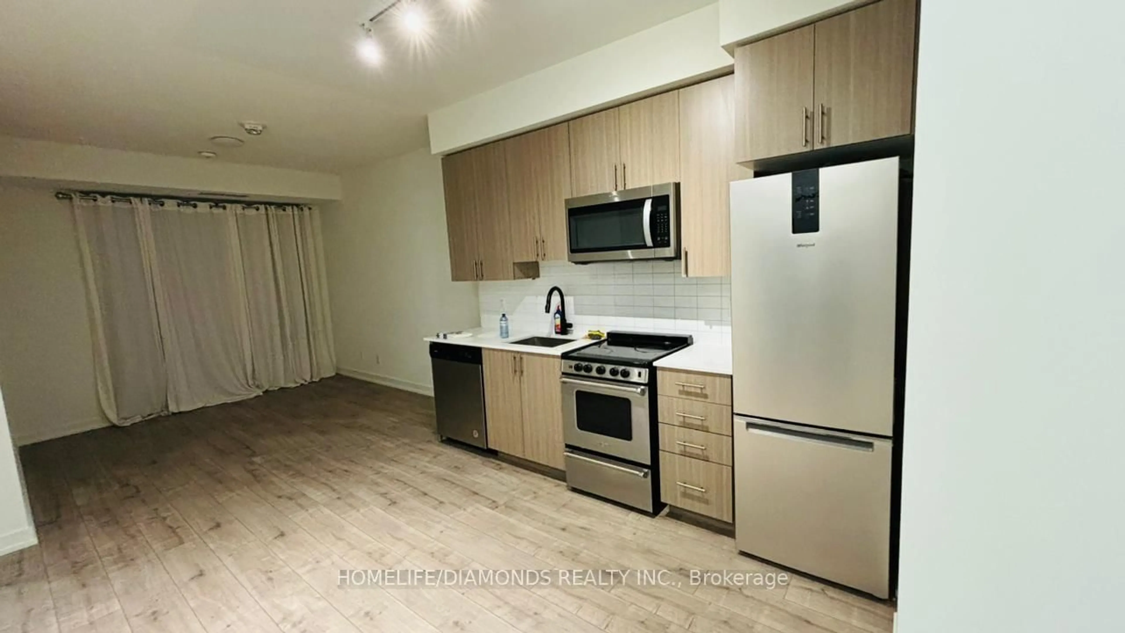 Standard kitchen, wood/laminate floor for 10 WILBY Cres #615, Toronto Ontario M9N 0B6