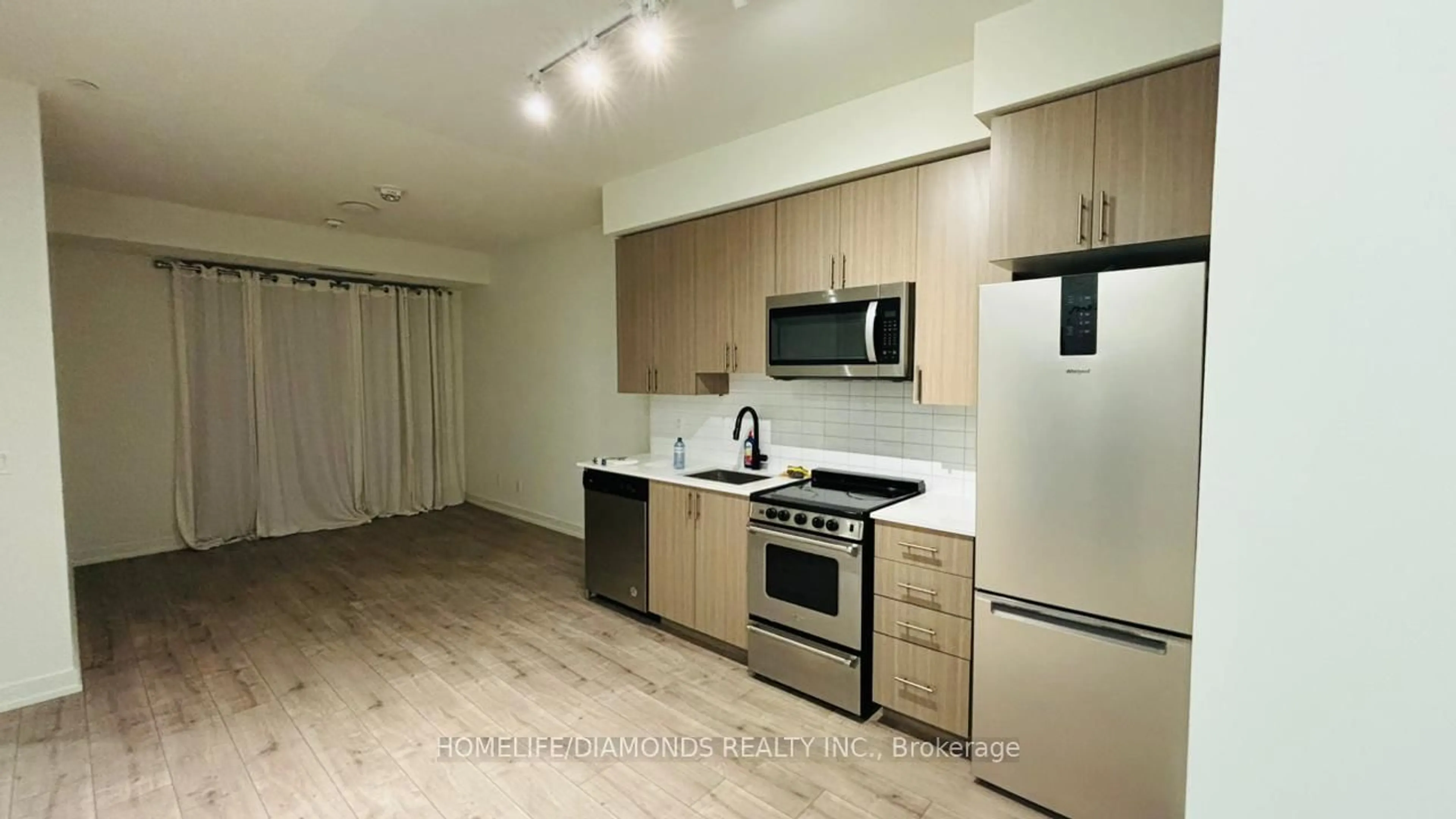 Standard kitchen, wood/laminate floor for 10 WILBY Cres #615, Toronto Ontario M9N 0B6