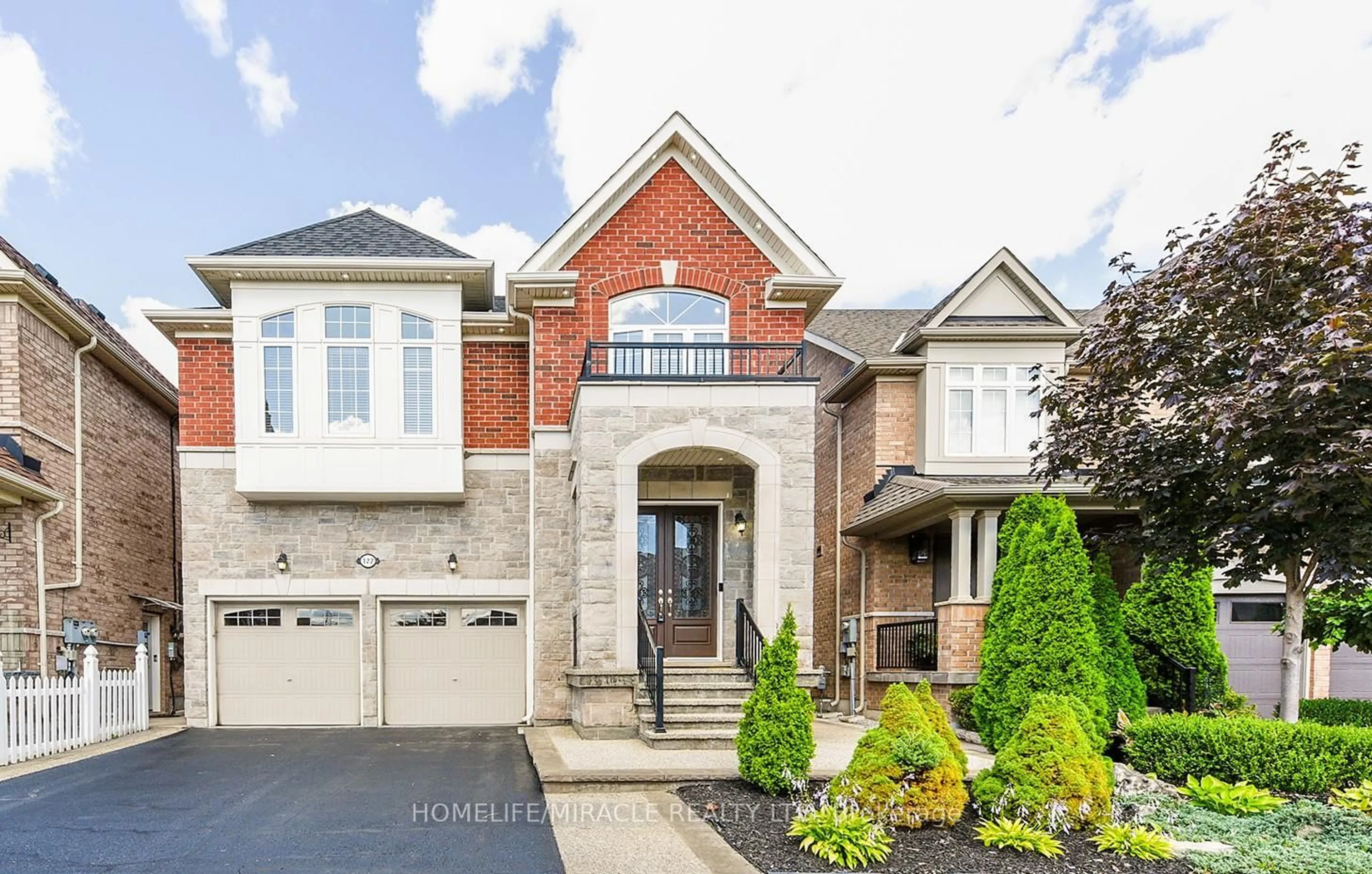 Home with brick exterior material, street for 122 Bonnie Braes Dr, Brampton Ontario L6Y 0W7