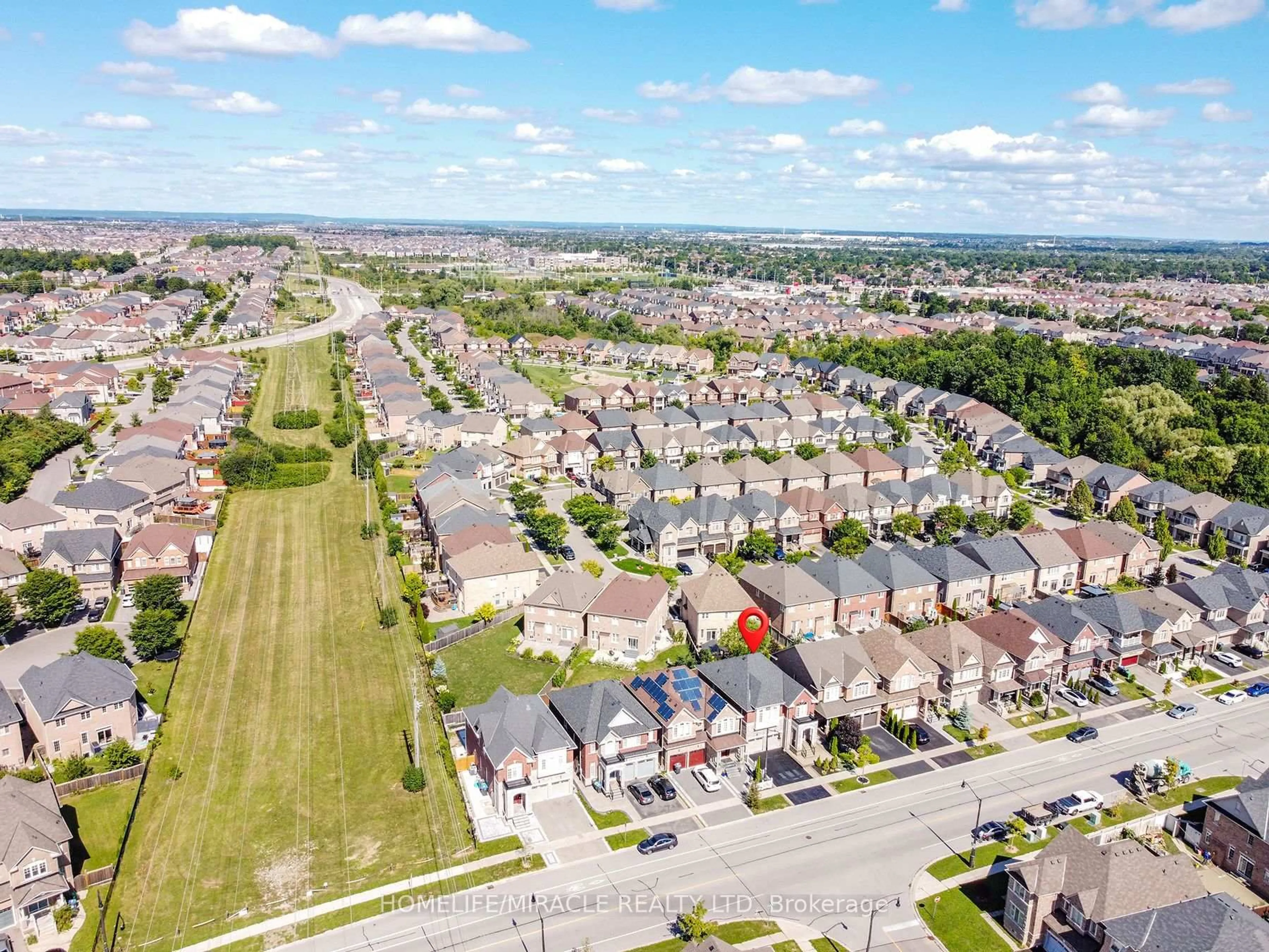 A pic from outside/outdoor area/front of a property/back of a property/a pic from drone, street for 122 Bonnie Braes Dr, Brampton Ontario L6Y 0W7
