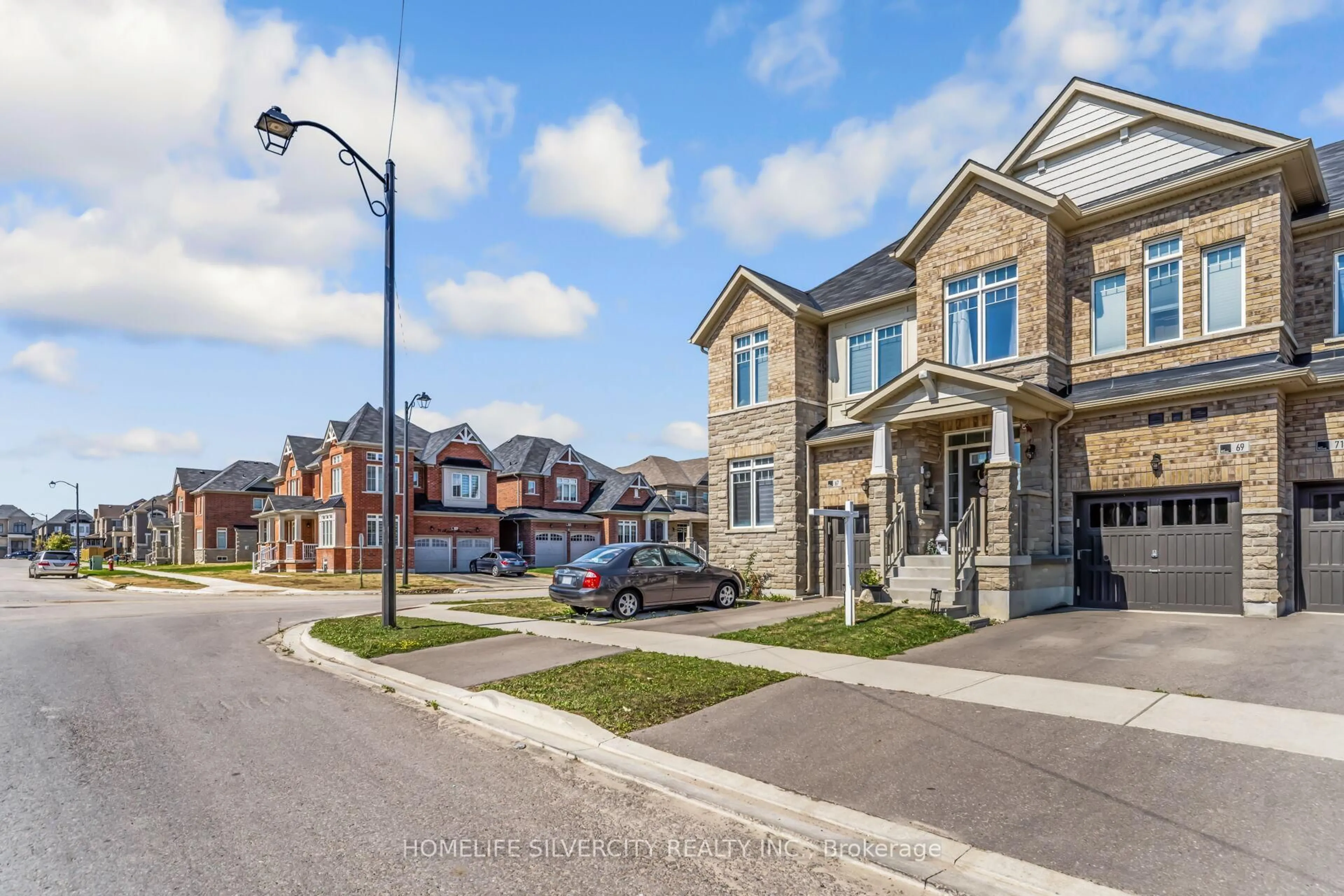 Home with brick exterior material, street for 69 Tundra Rd, Caledon Ontario L7C 4G9