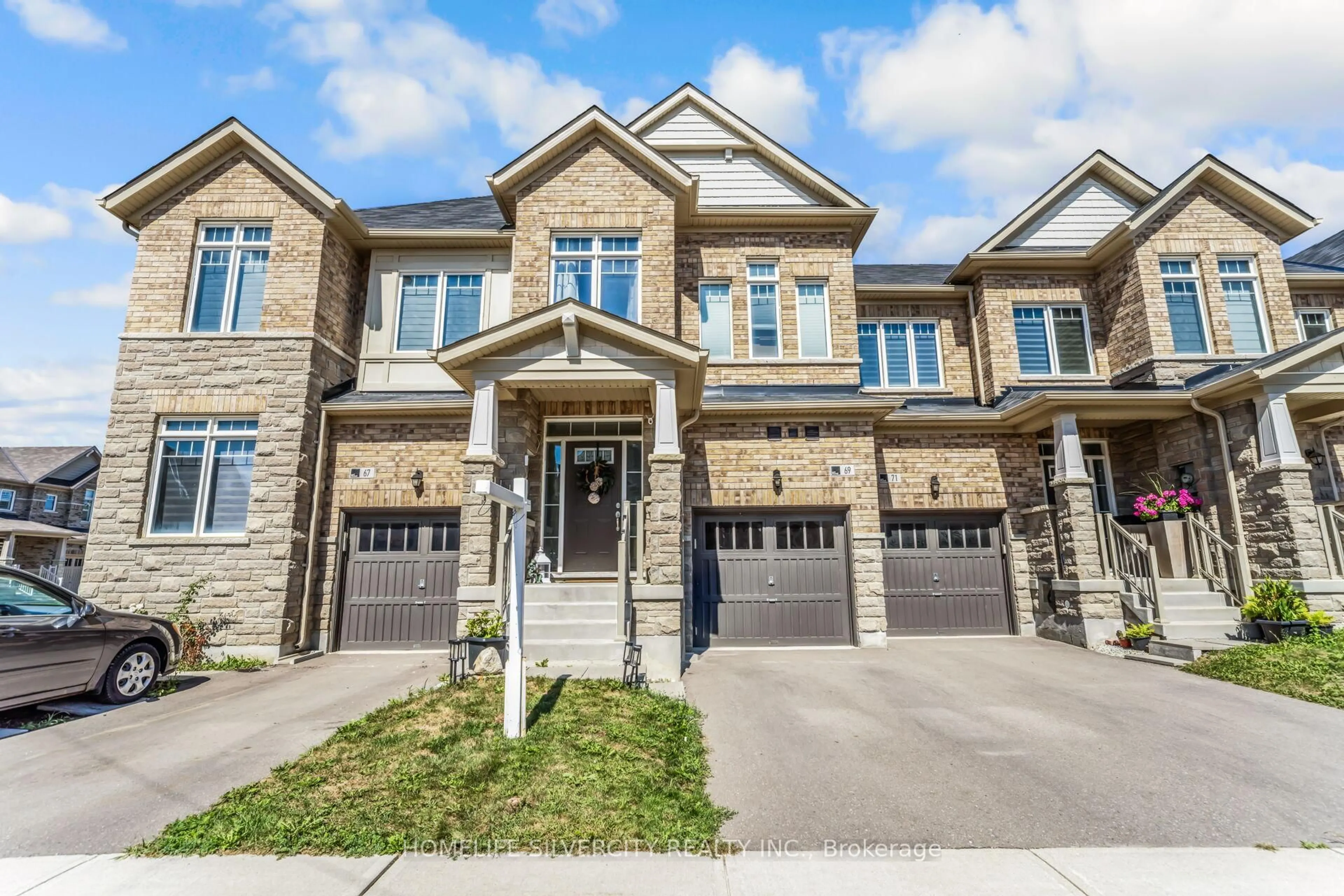 Home with brick exterior material, street for 69 Tundra Rd, Caledon Ontario L7C 4G9