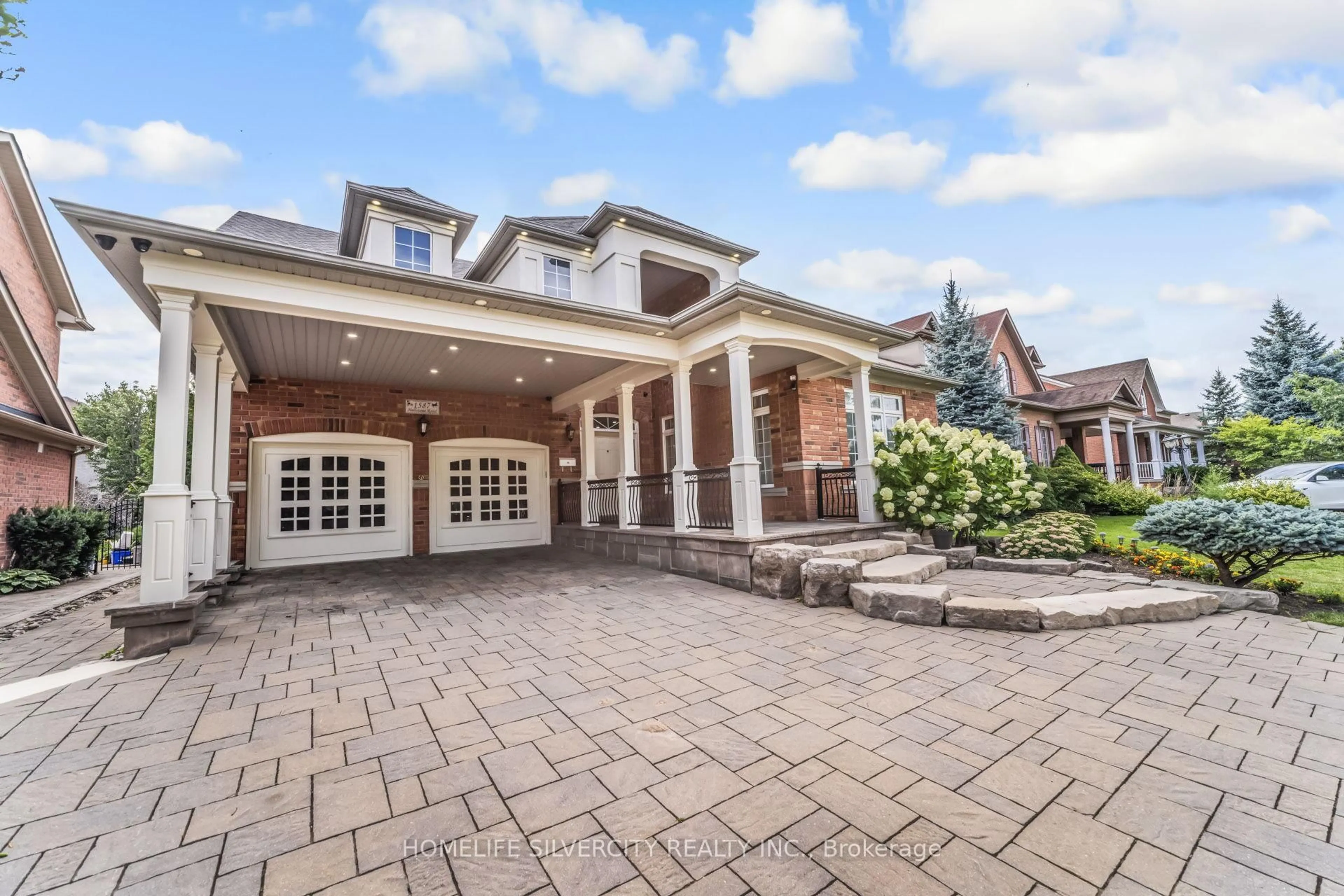 Home with brick exterior material, street for 1587 Hallstone Rd, Brampton Ontario L6Y 5K8