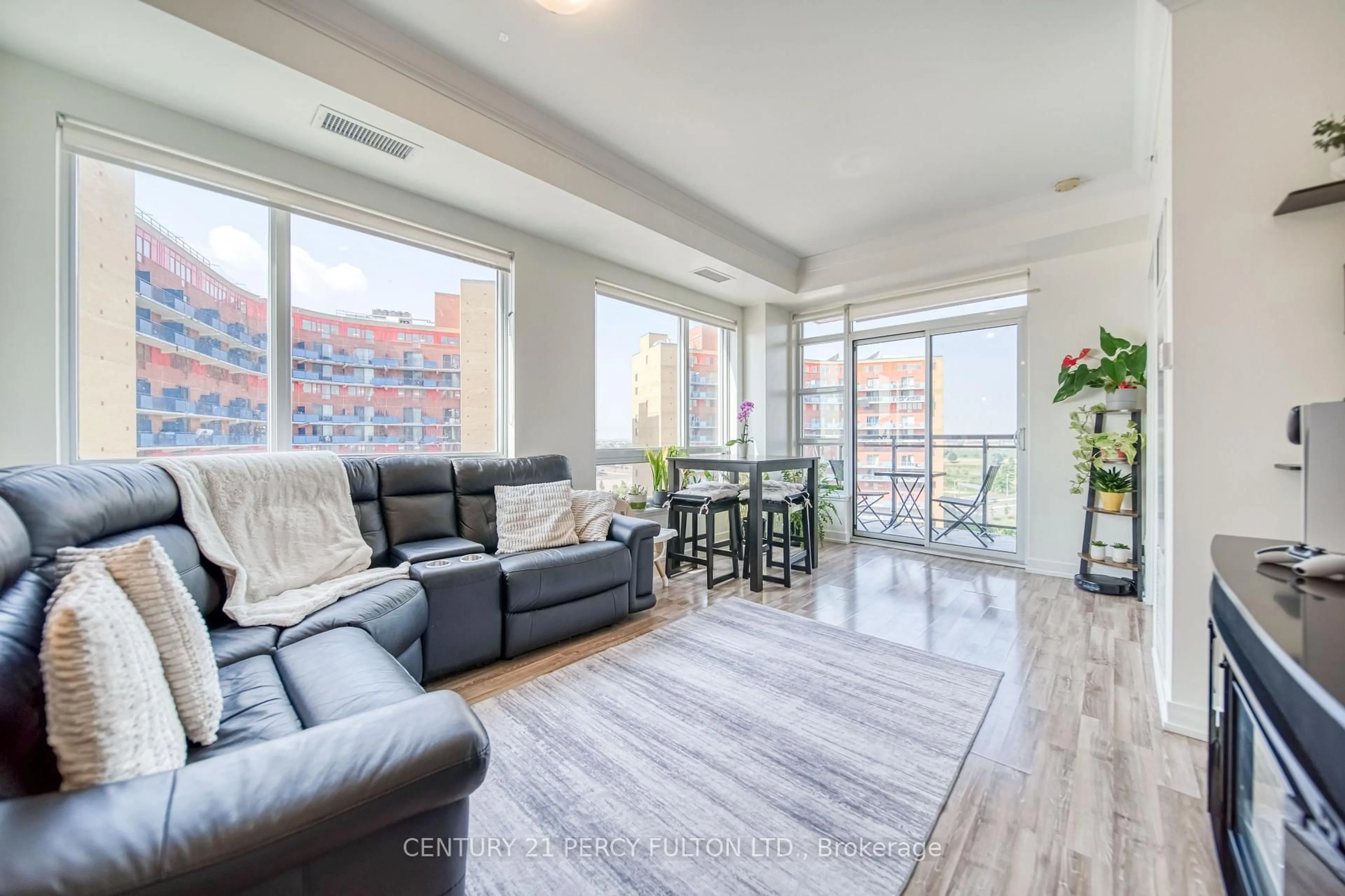Living room with furniture, unknown for 840 Queens Plate Dr #902, Toronto Ontario M9W 7J9