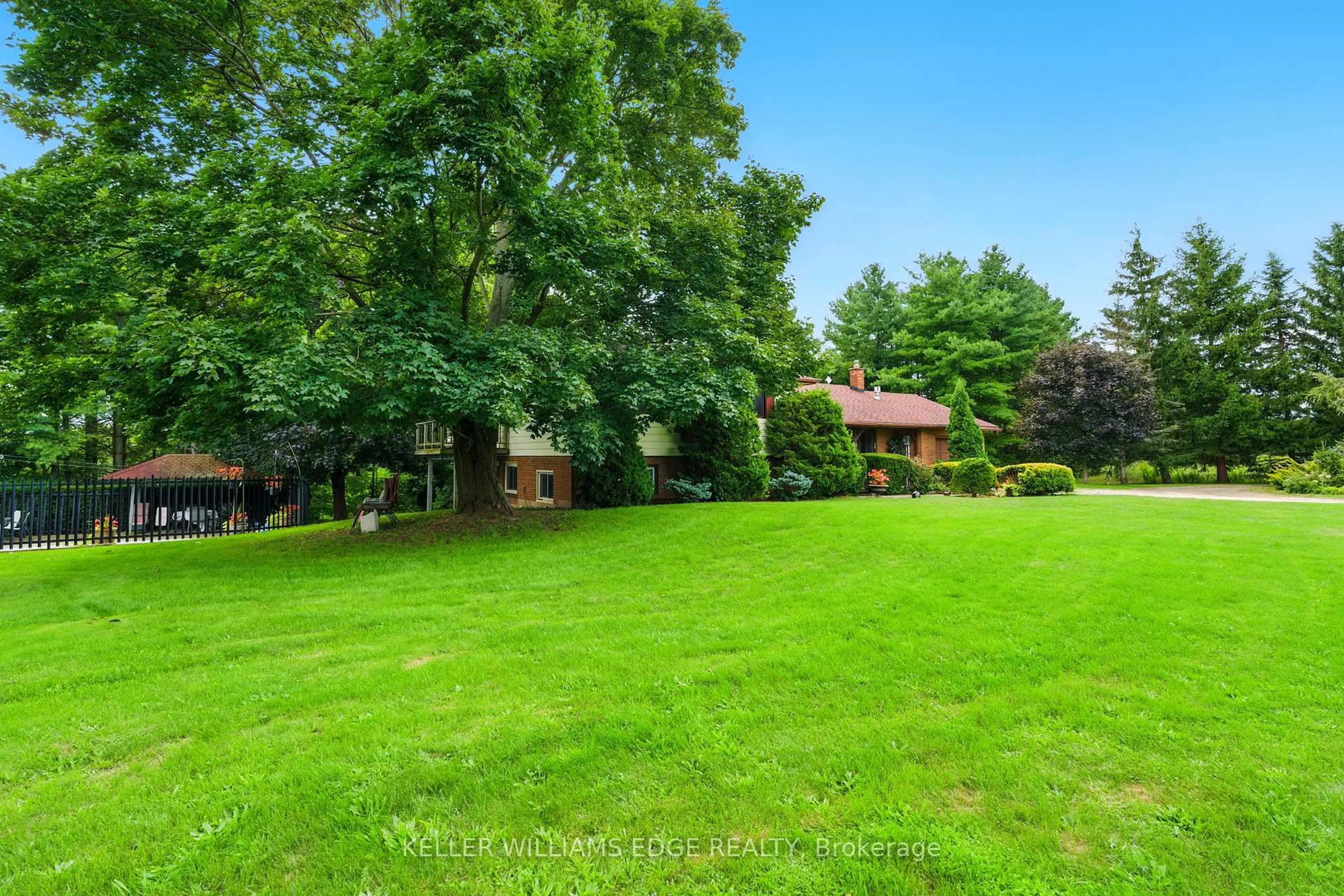A pic from outside/outdoor area/front of a property/back of a property/a pic from drone, forest/trees view for 6101 Walkers Line, Burlington Ontario L7M 0R2