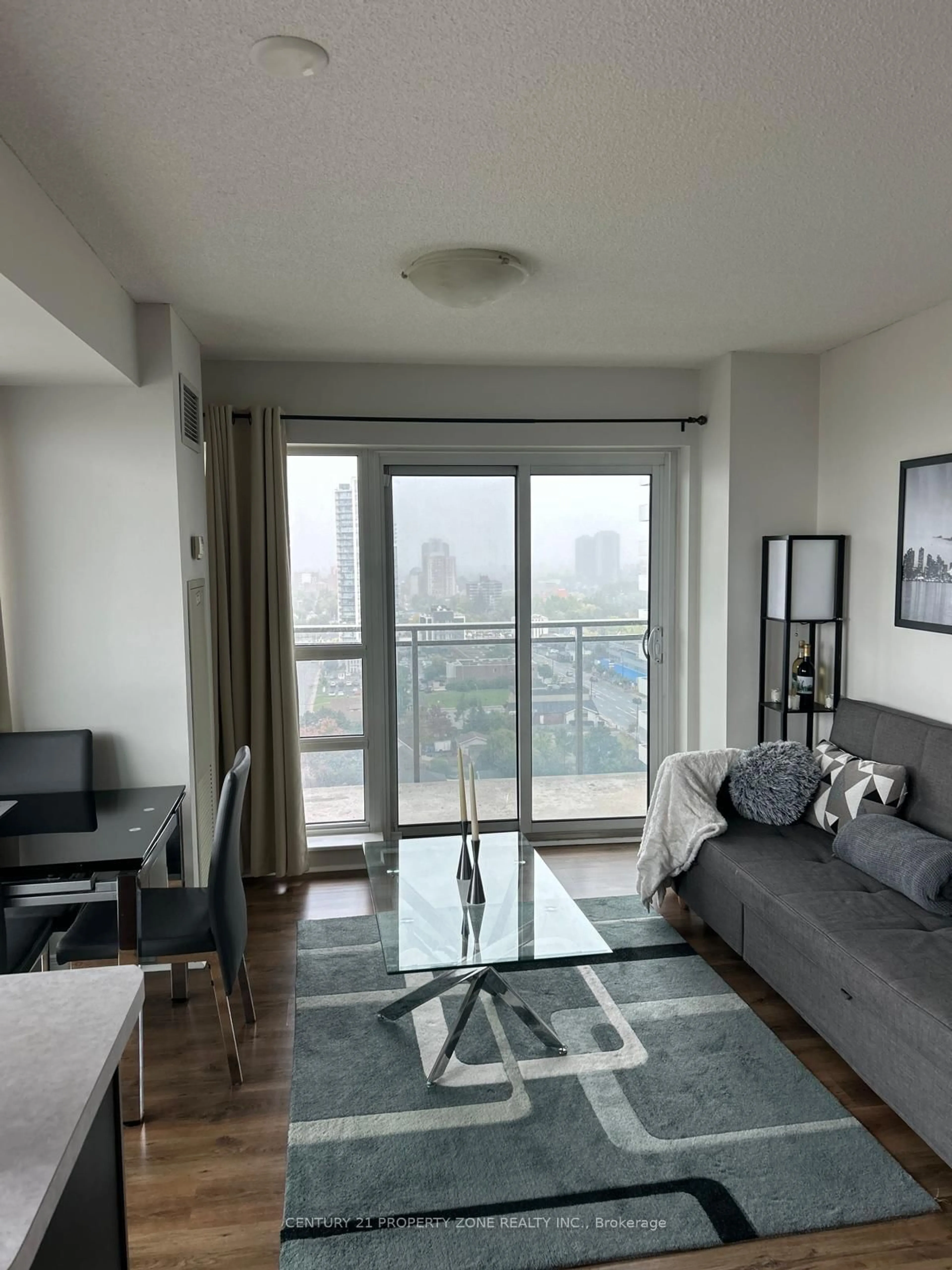 Living room with furniture, unknown for 215 Queen St #1804, Brampton Ontario L6W 0A9