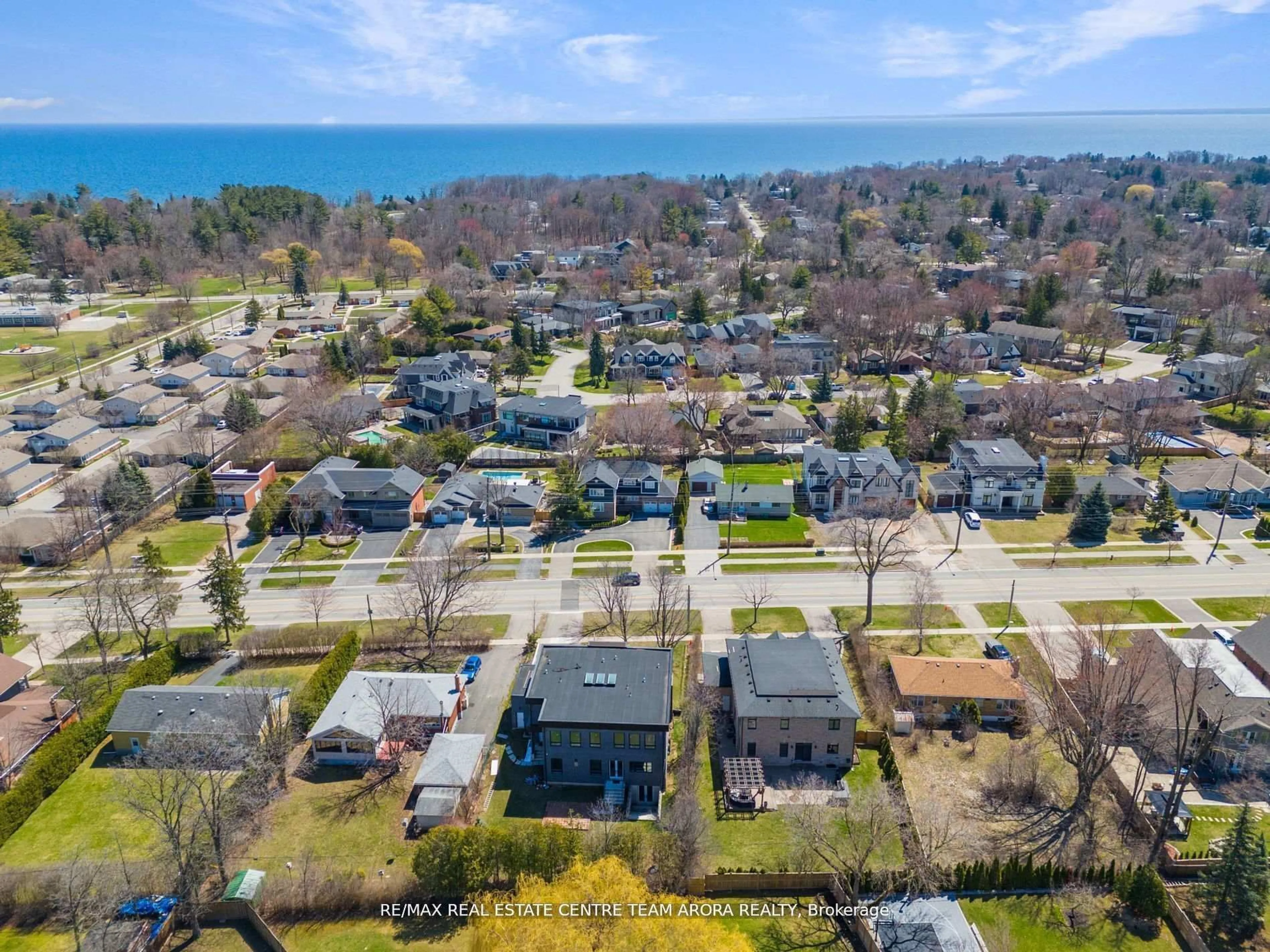A pic from outside/outdoor area/front of a property/back of a property/a pic from drone, water/lake/river/ocean view for 1325 Rebecca St, Oakville Ontario L6L 1Z3