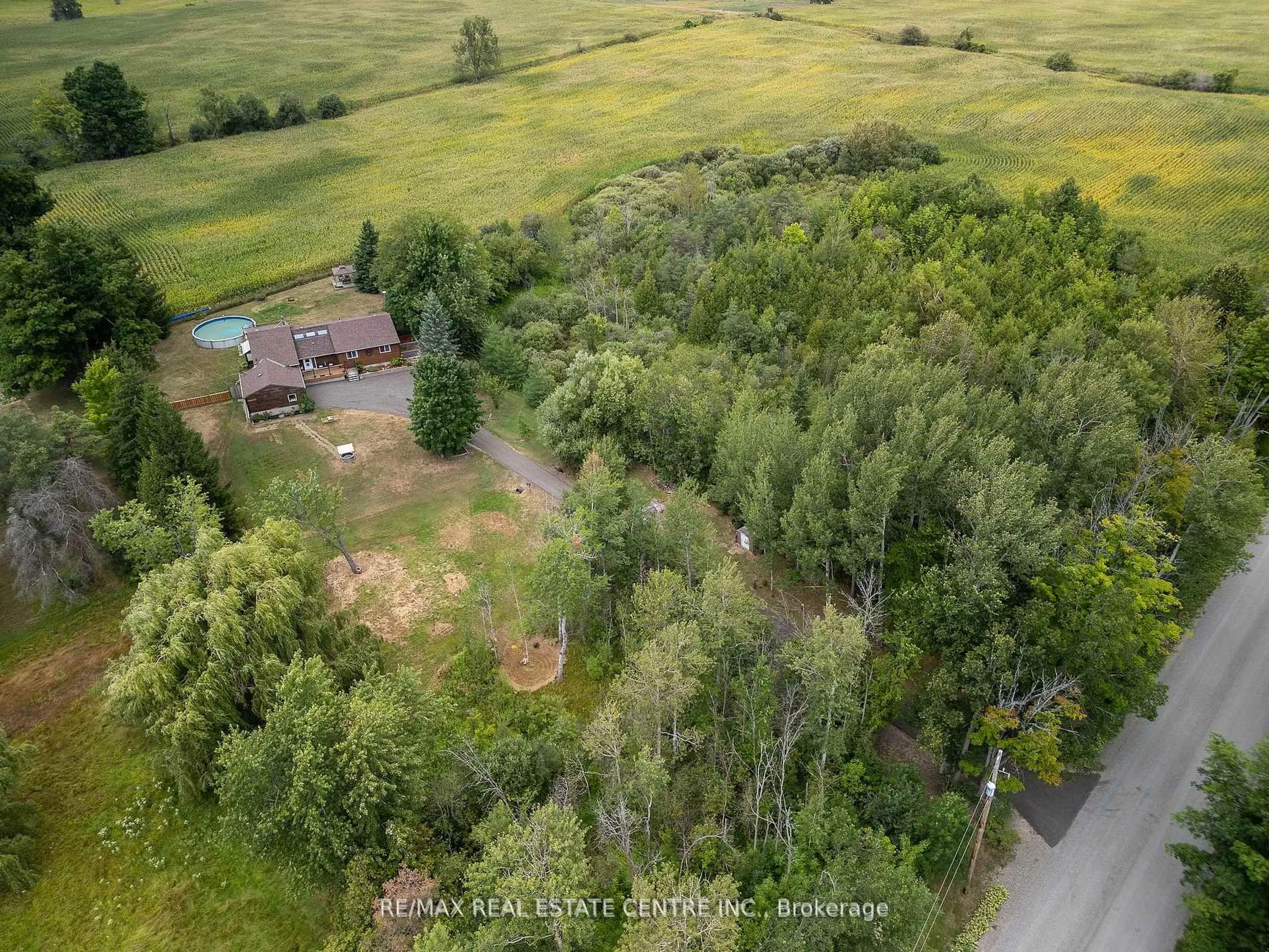 A pic from outside/outdoor area/front of a property/back of a property/a pic from drone, forest/trees view for 3762 Highpoint Sdrd, Caledon Ontario L7K 0J4