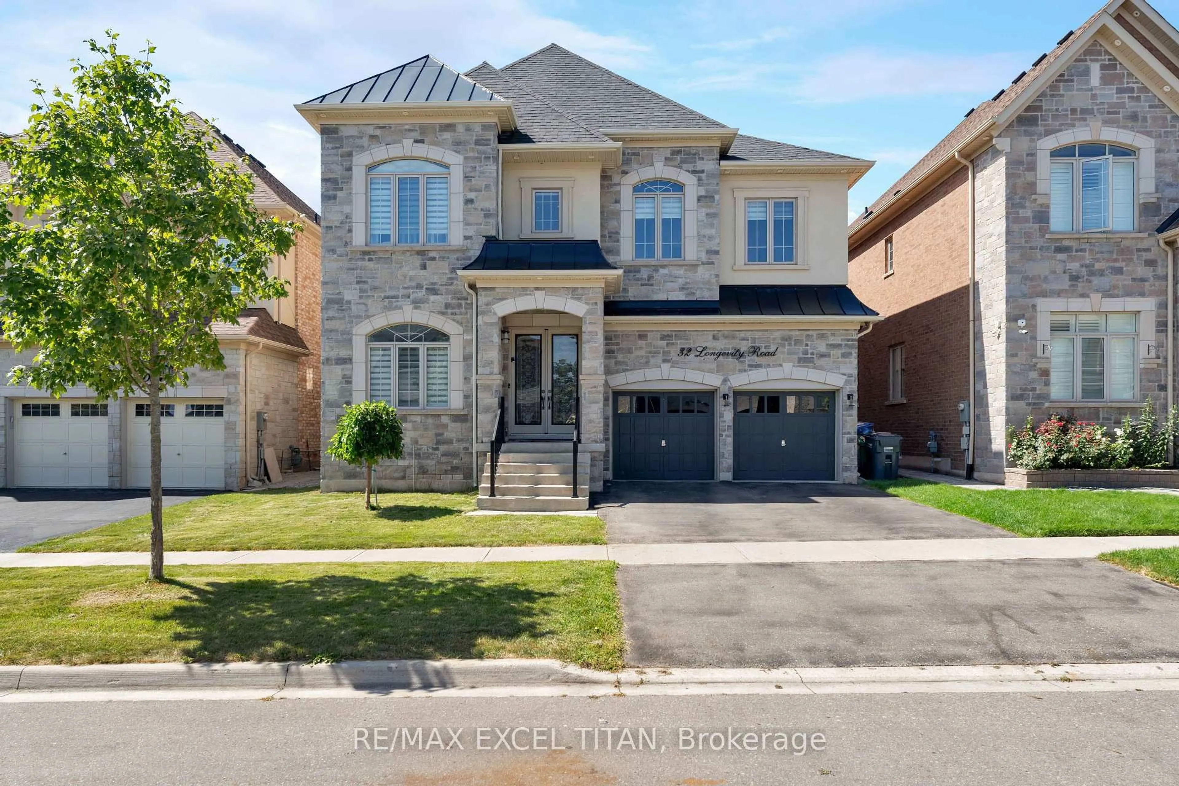 Home with brick exterior material, street for 32 Longevity Rd, Brampton Ontario L6X 5P3