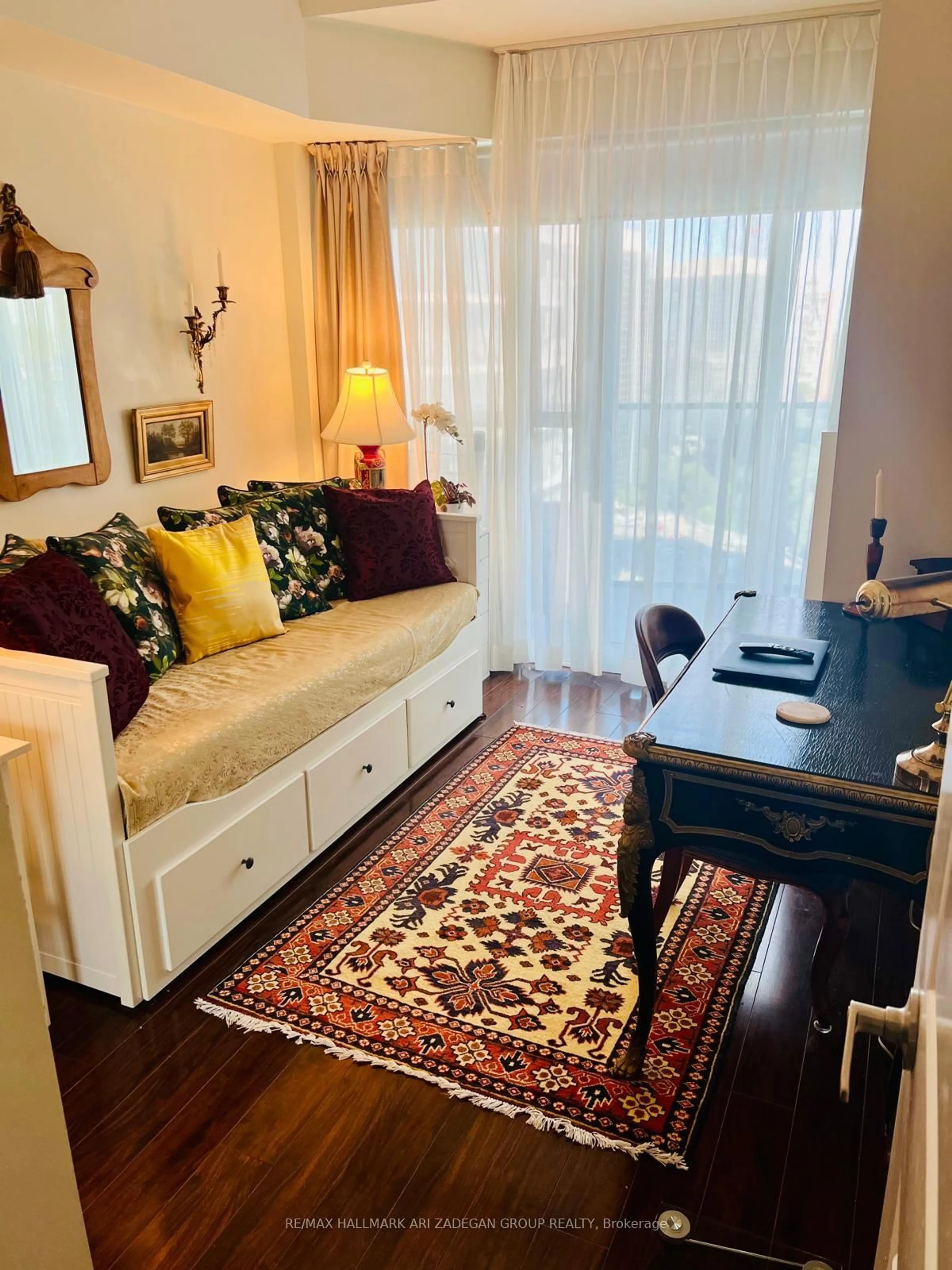 Living room with furniture, wood/laminate floor for 60 Absolute Ave #1507, Mississauga Ontario L4Z 0A9