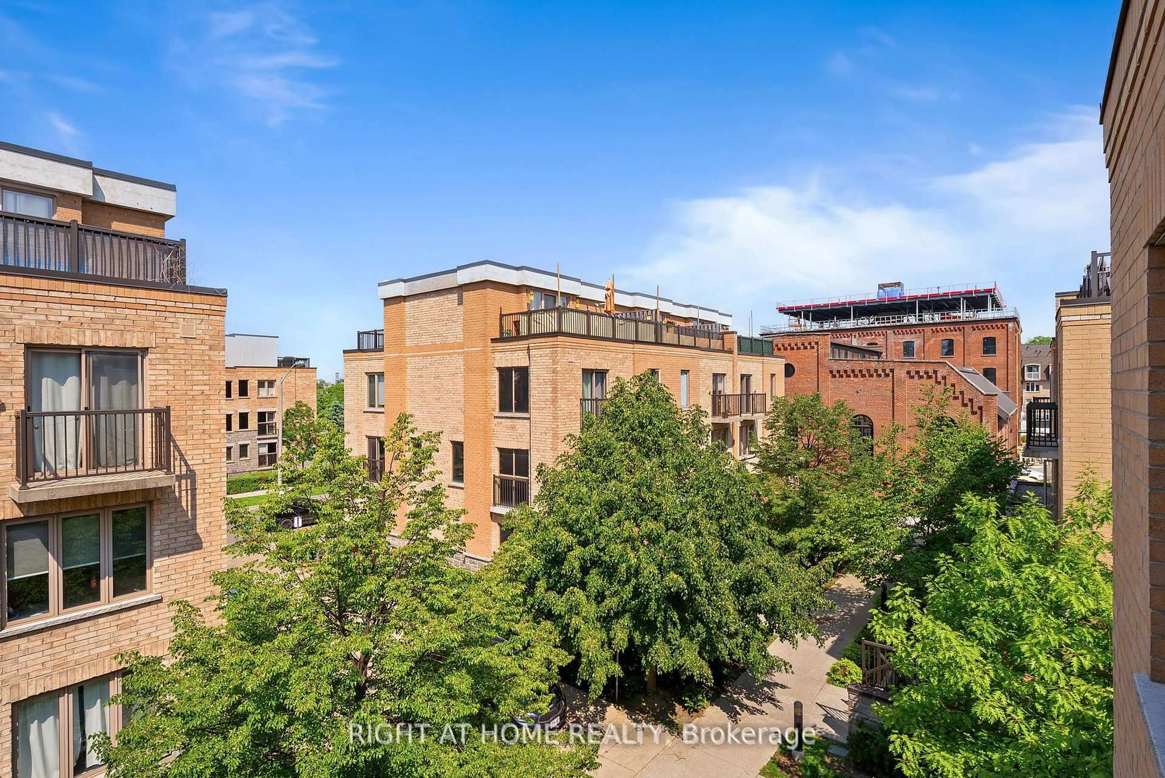 A pic from outside/outdoor area/front of a property/back of a property/a pic from drone, city buildings view from balcony for 11 Foundry Ave #229, Toronto Ontario M6H 0B7