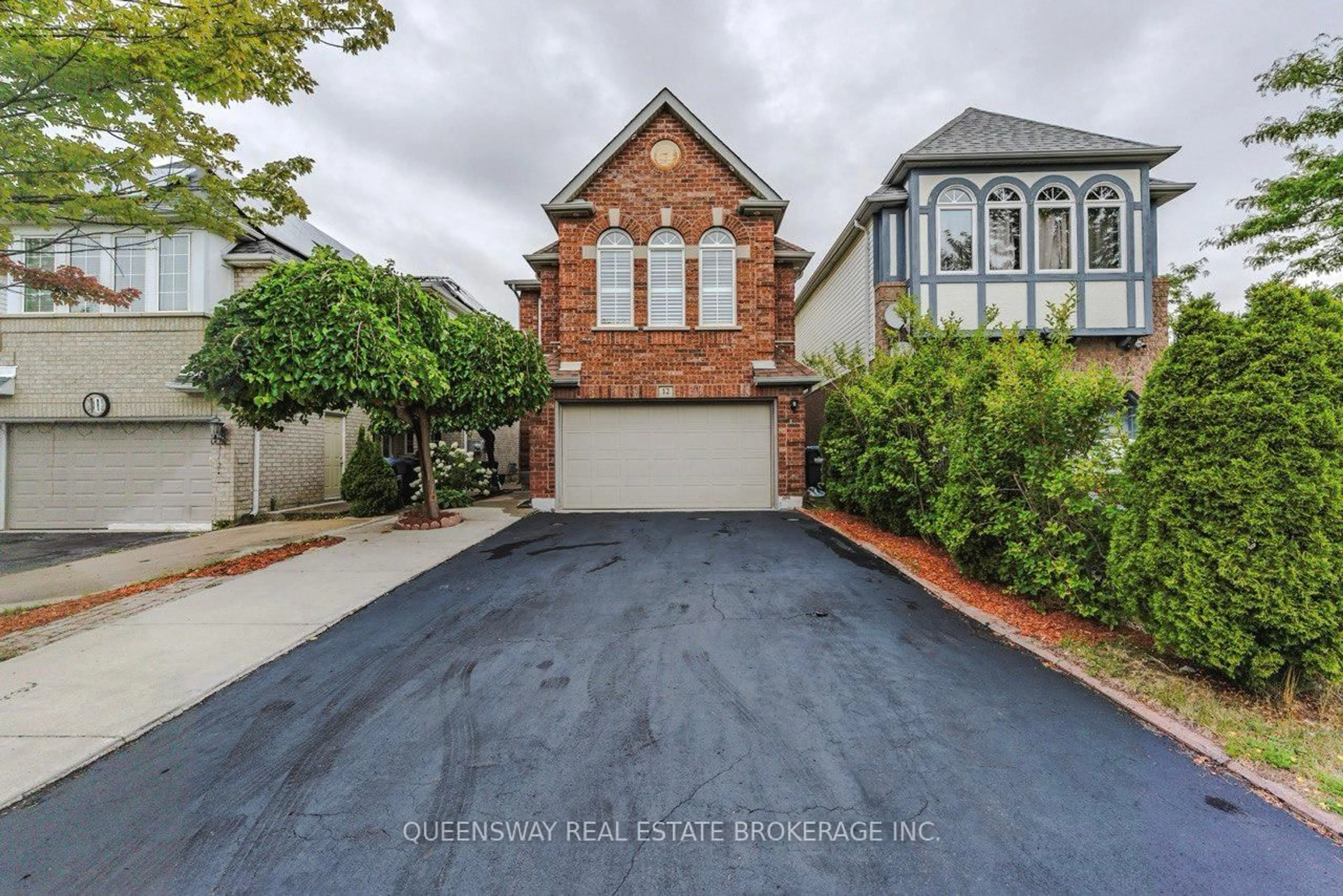 Home with brick exterior material, street for 12 Dandelion Rd, Brampton Ontario L6R 1X3