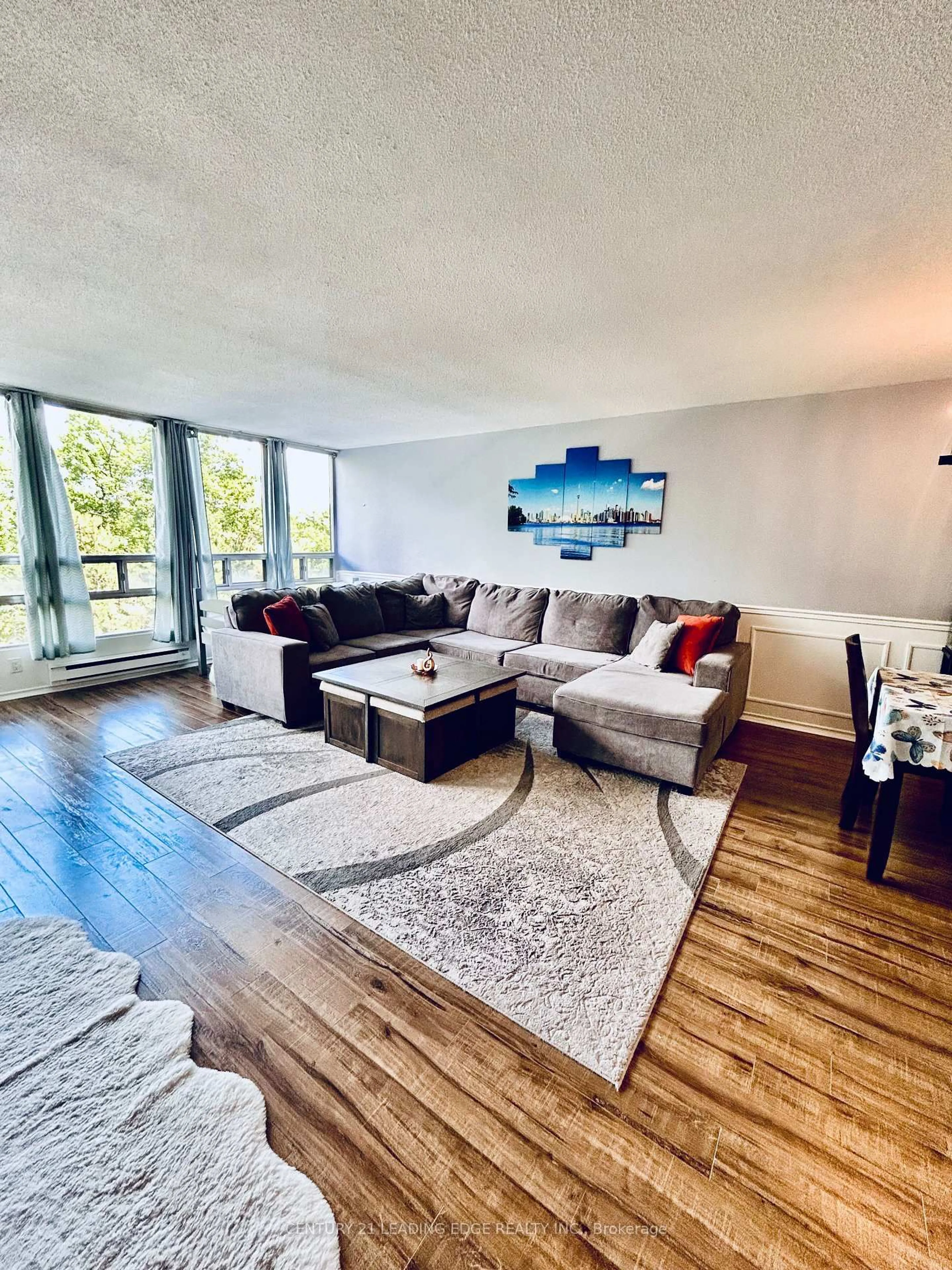 Living room with furniture, unknown for 310 Mill St #401, Brampton Ontario L6Y 3B1