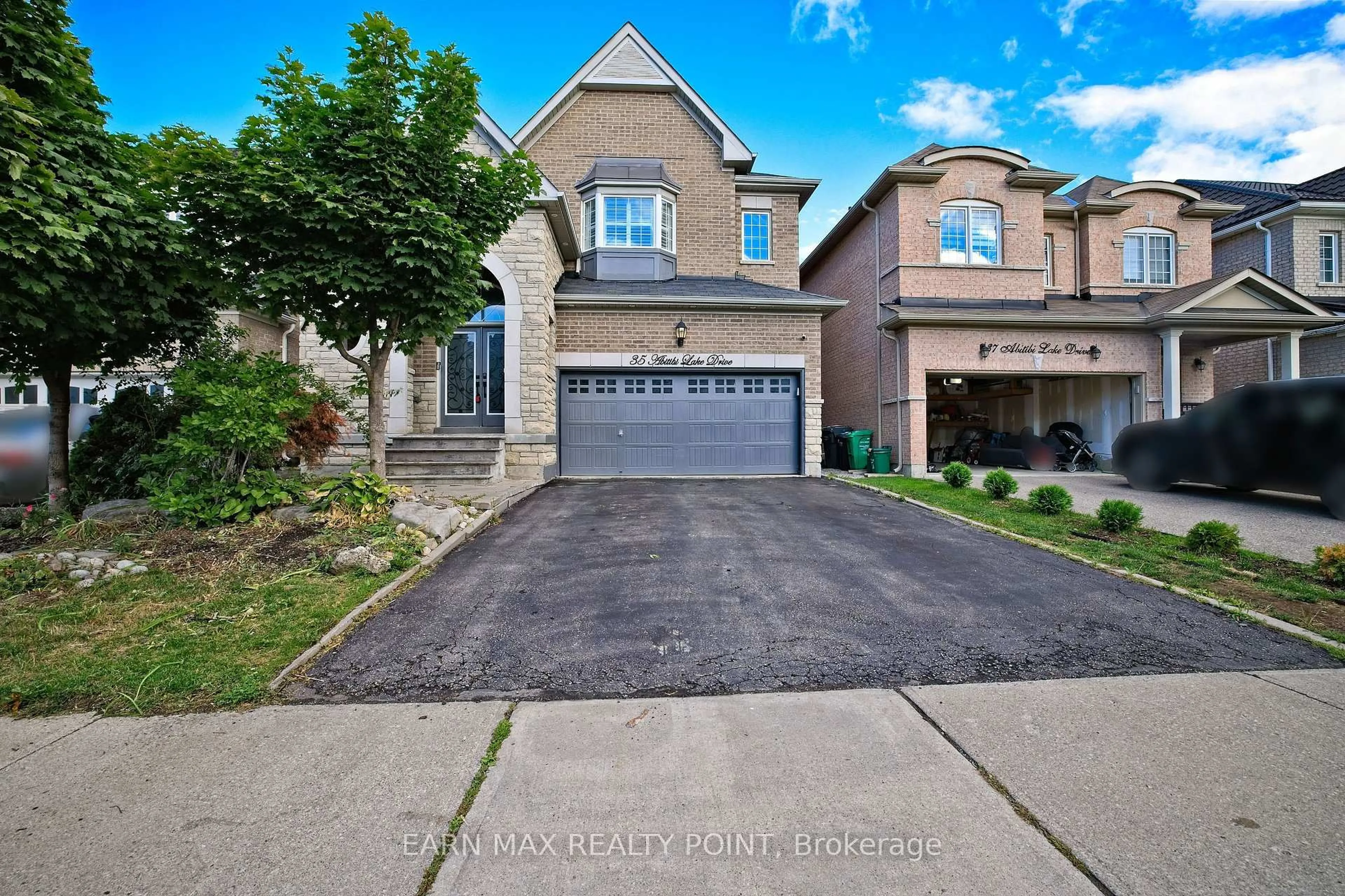 Home with brick exterior material, street for 35 Abitibi Lake Dr, Brampton Ontario L6R 0Y3