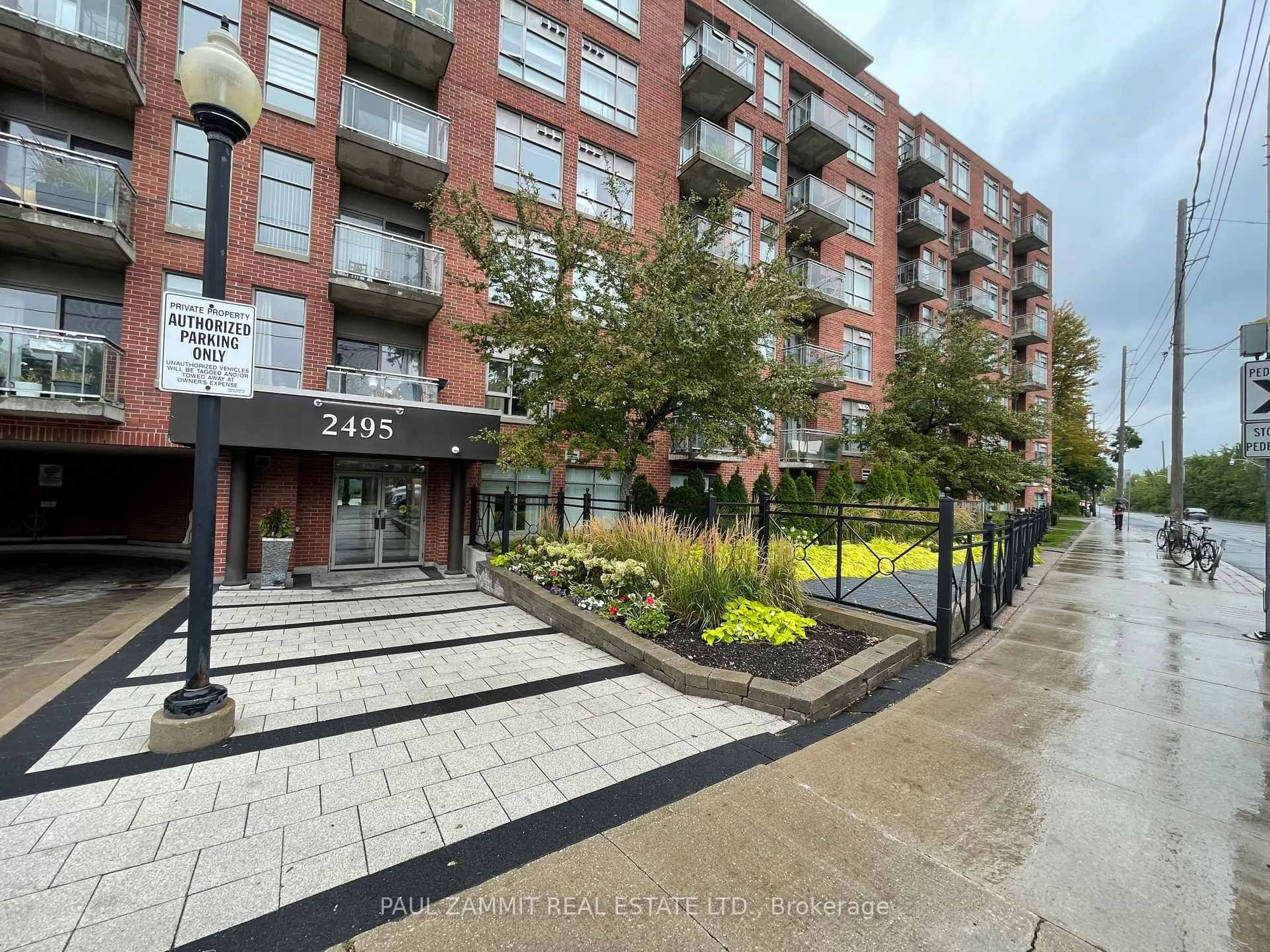 A pic from outside/outdoor area/front of a property/back of a property/a pic from drone, street for 2495 Dundas St #409, Toronto Ontario M6P 1X4
