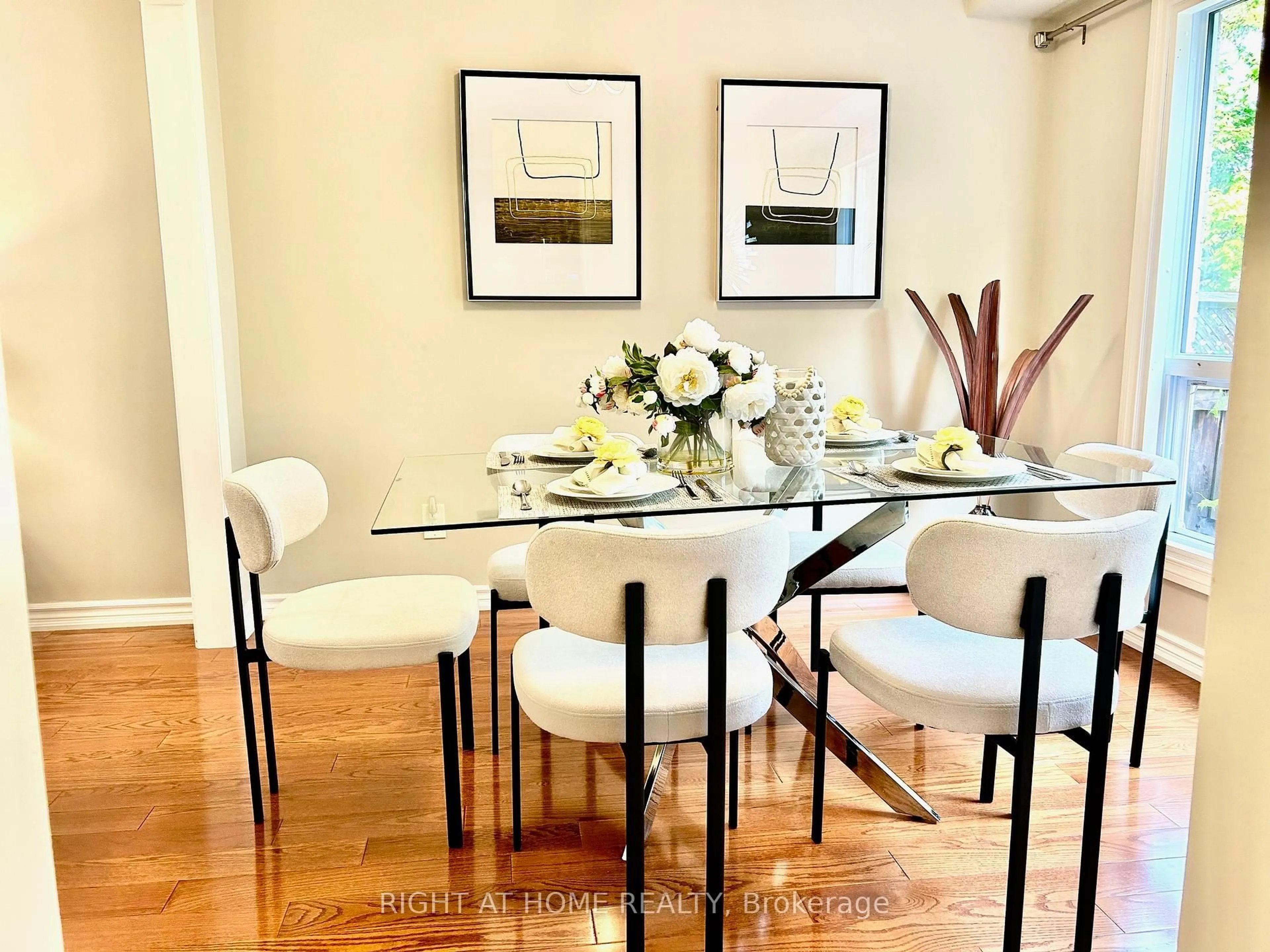 Dining room, wood/laminate floor for 32 Heathcliffe Sq, Brampton Ontario L6S 5P7