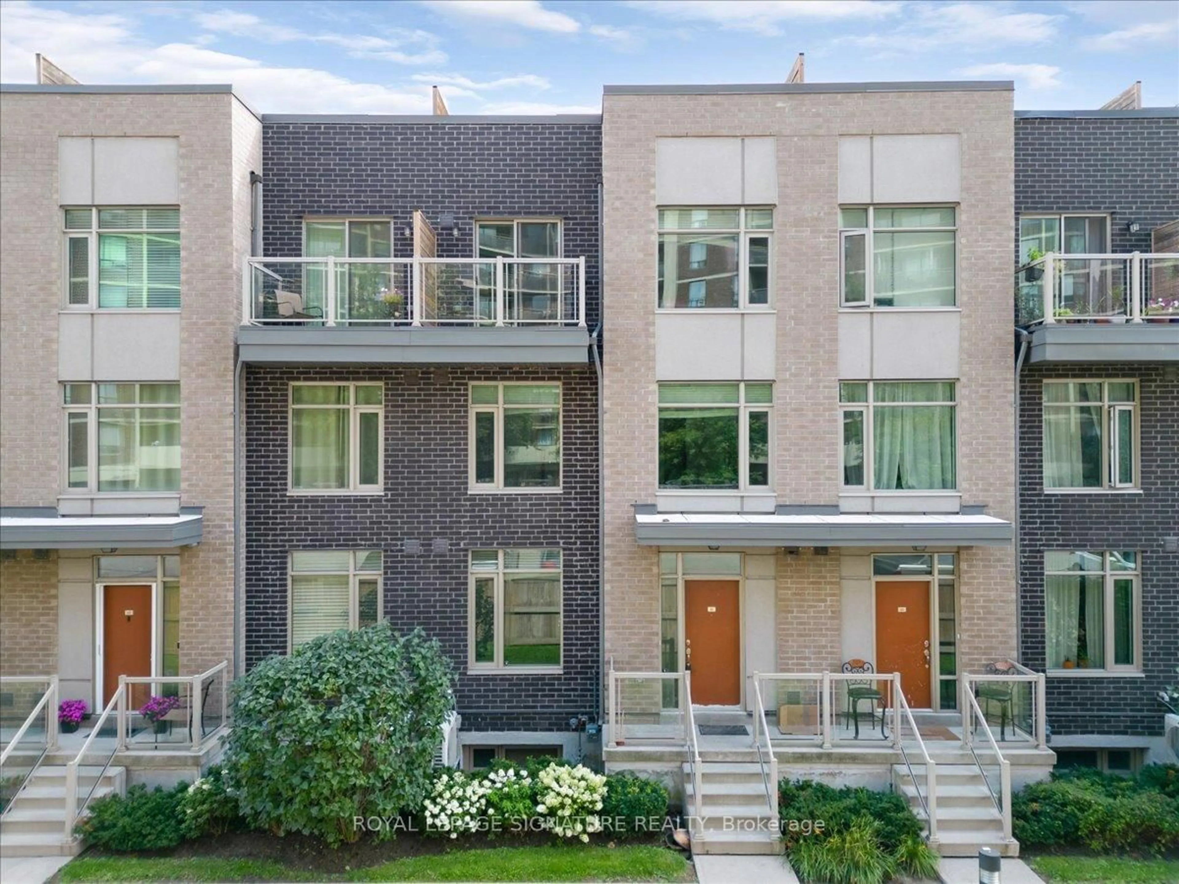 Home with brick exterior material, street for 35 Applewood Lane #61, Toronto Ontario M9C 0C1