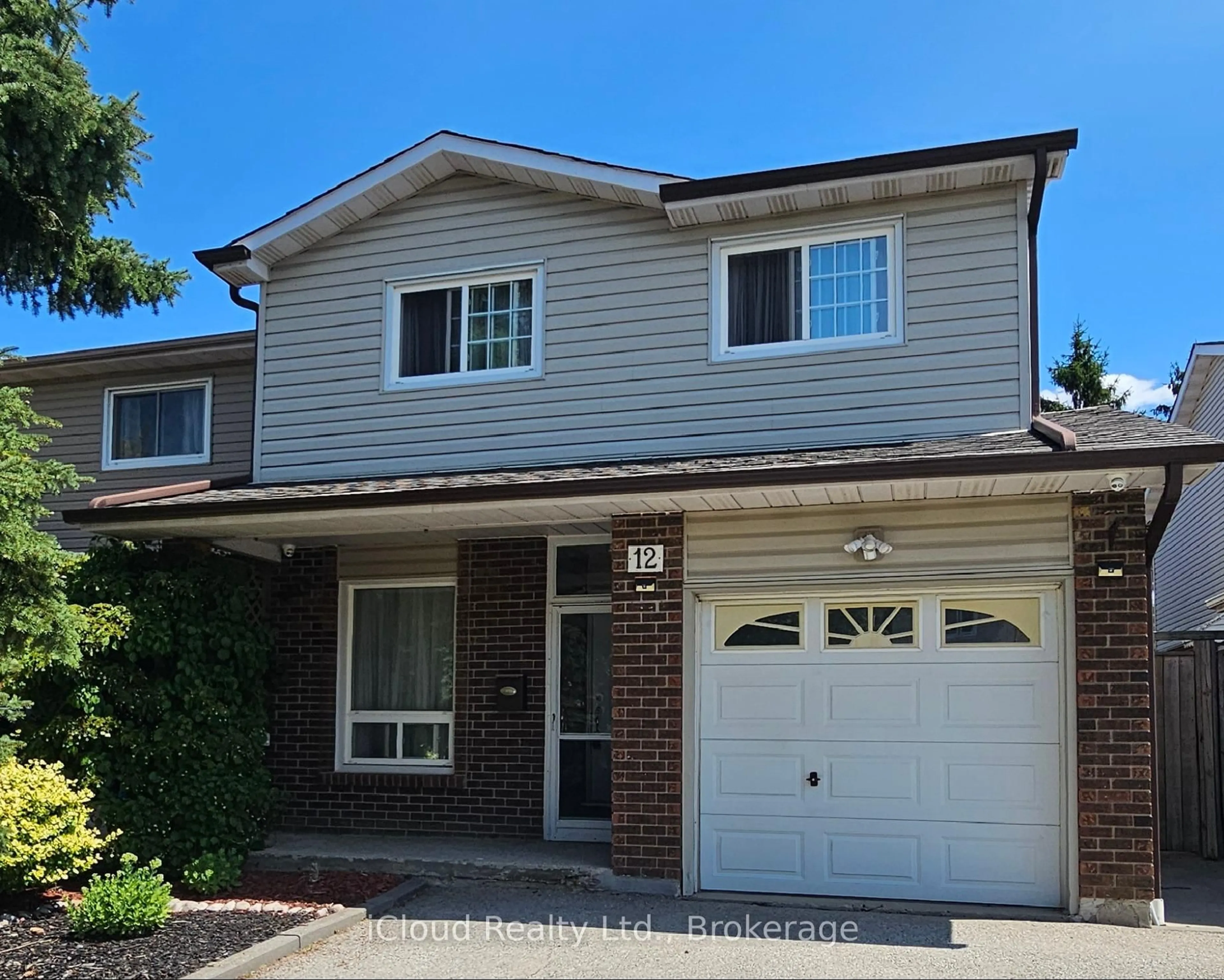 Home with brick exterior material, street for 12 Simmons Blvd, Brampton Ontario L6V 3V5