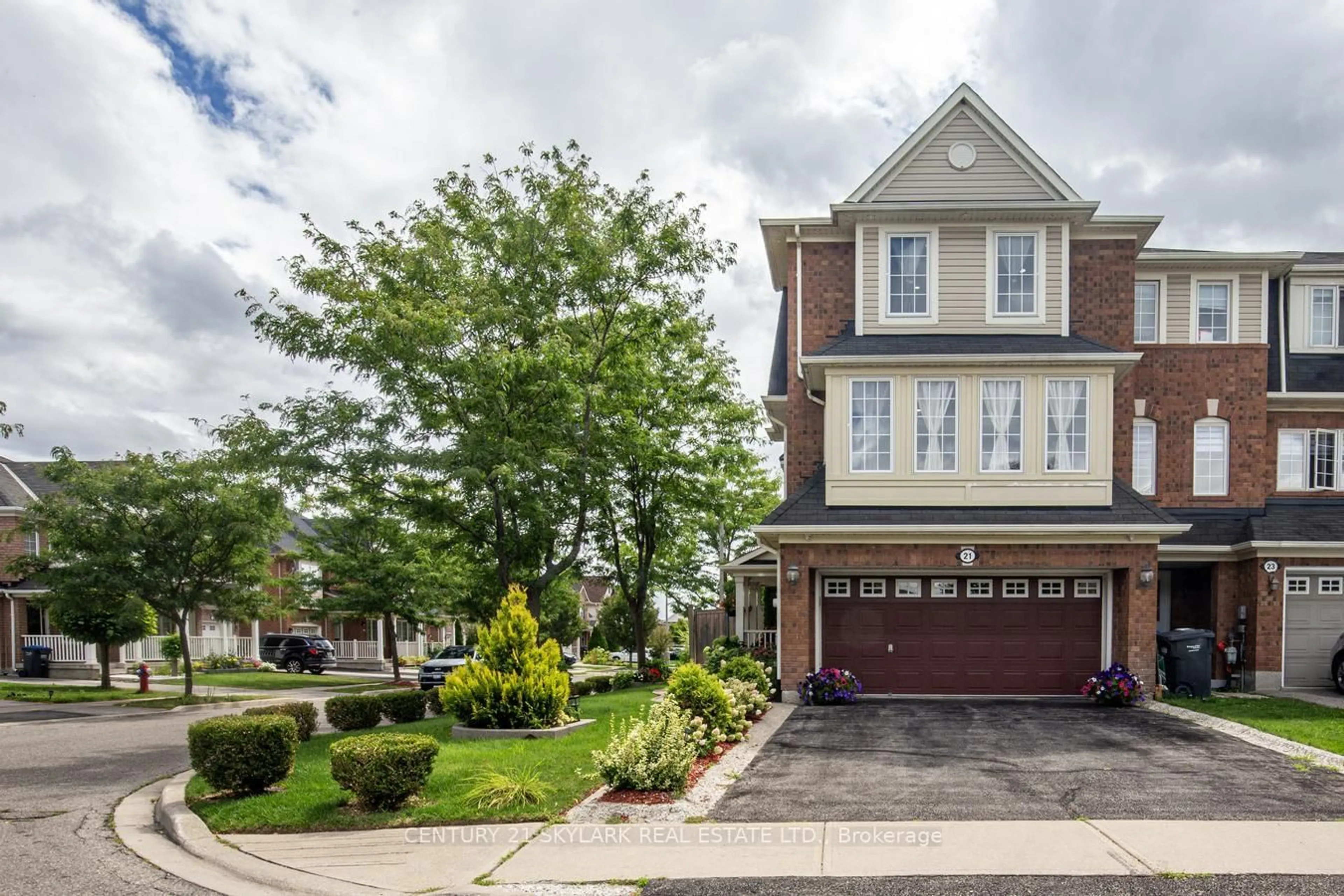 Home with brick exterior material, street for 21 Decker Hollow Circ, Brampton Ontario L6X 0K9